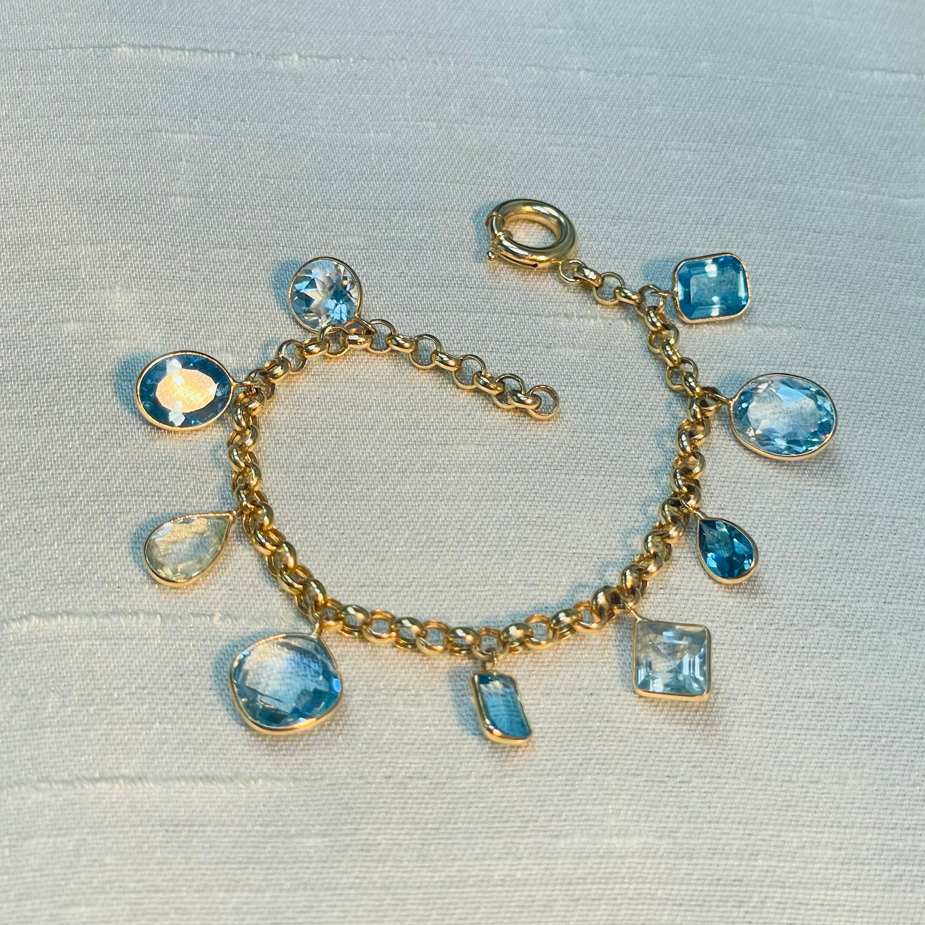 Natural Blue Topaz Dangling 14K Yellow Gold Charm Bracelet