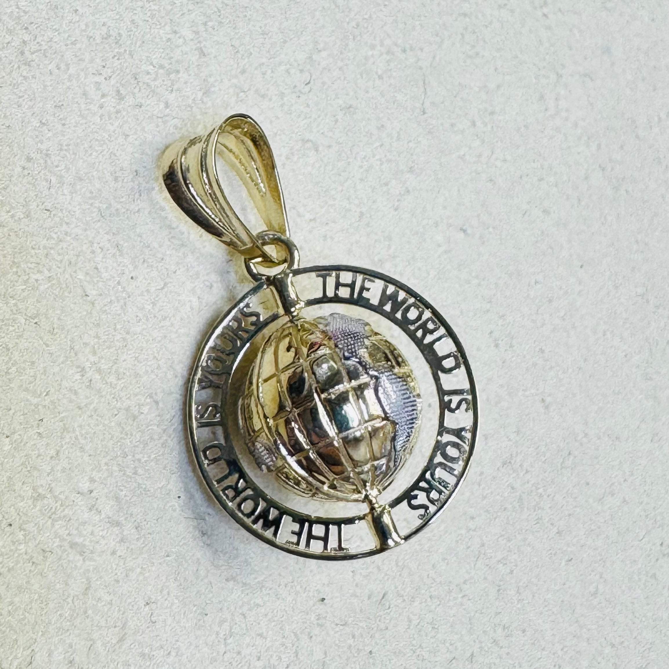 The World Is Yours 10K Yellow Gold Spinning Globe Charm