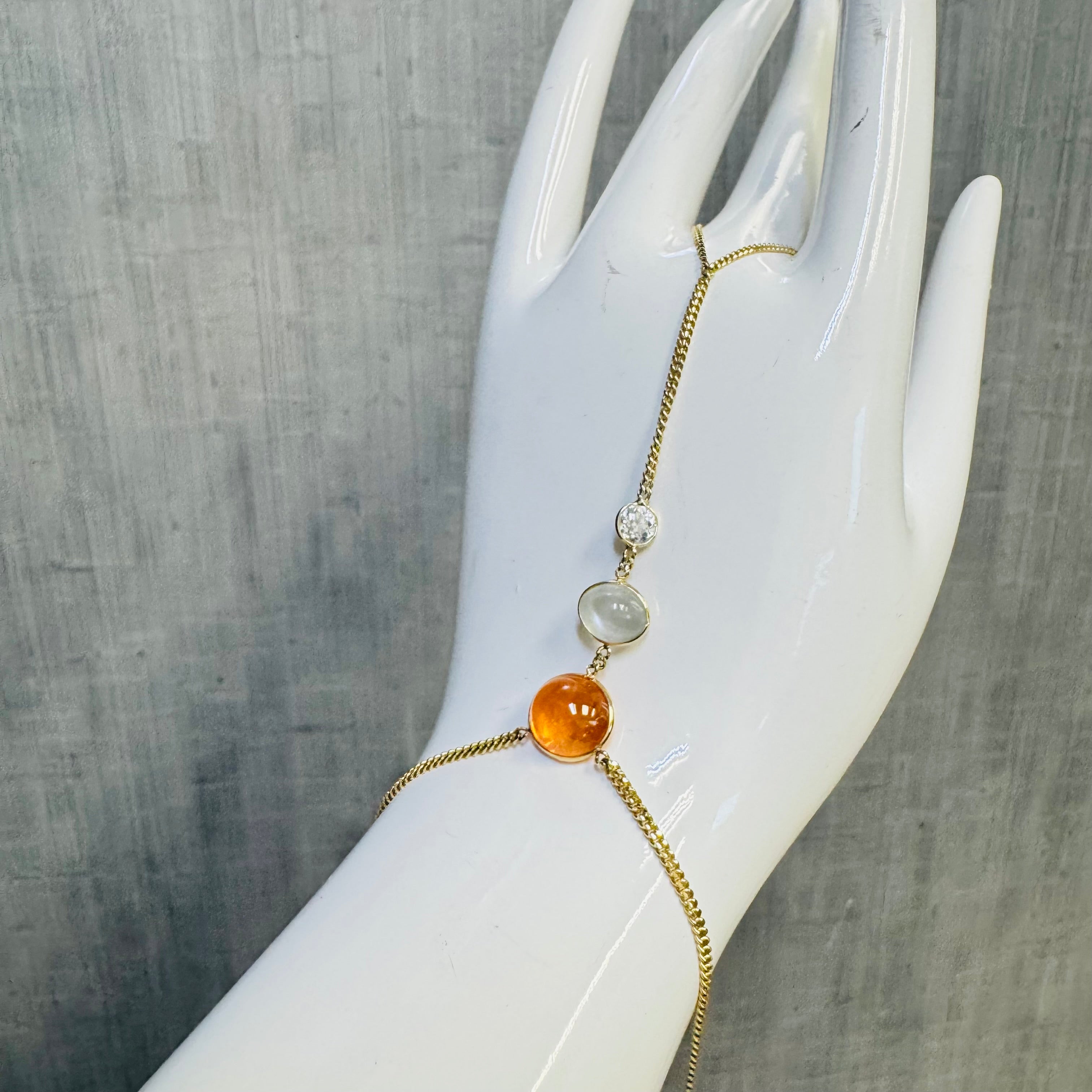 Mandarin Garnet Moonstone and Old Mine Cut Diamond 14K Yellow Gold Hand Chain