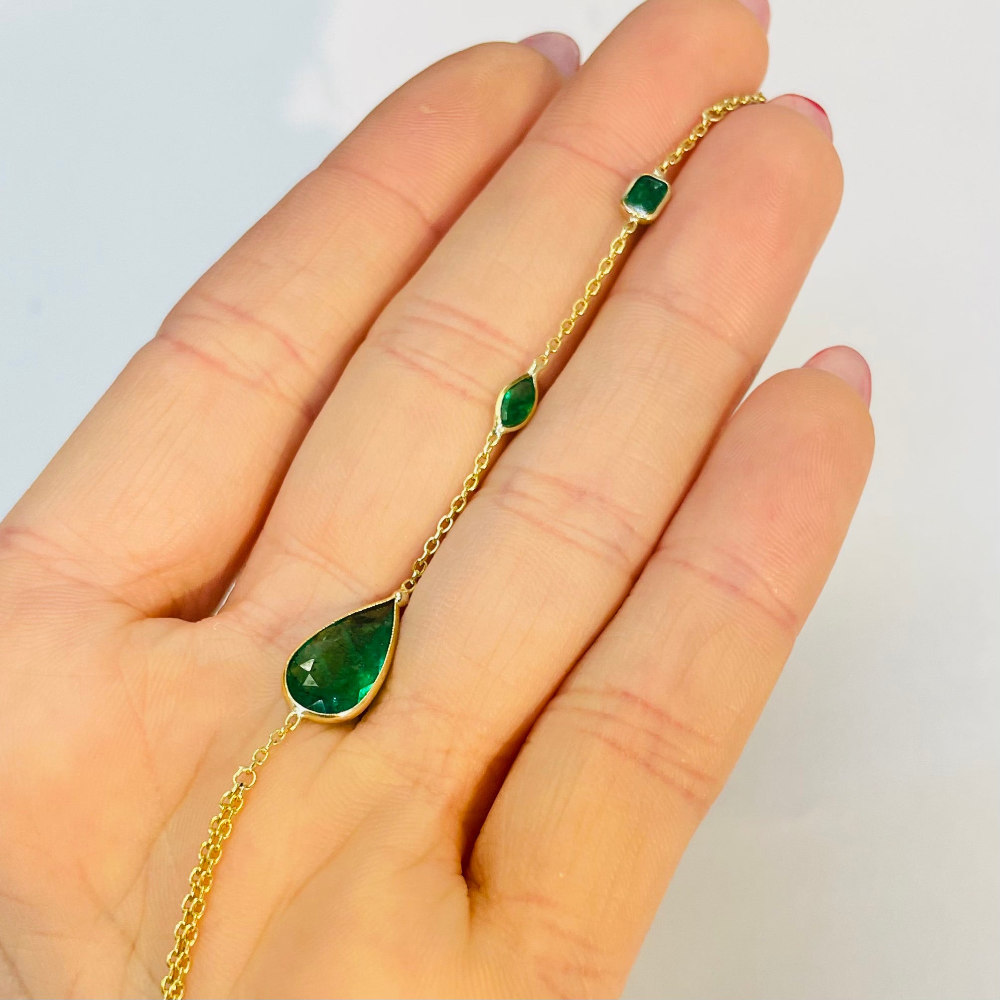 14k Yellow Gold 3 Stone Colombian Emerald Handchain