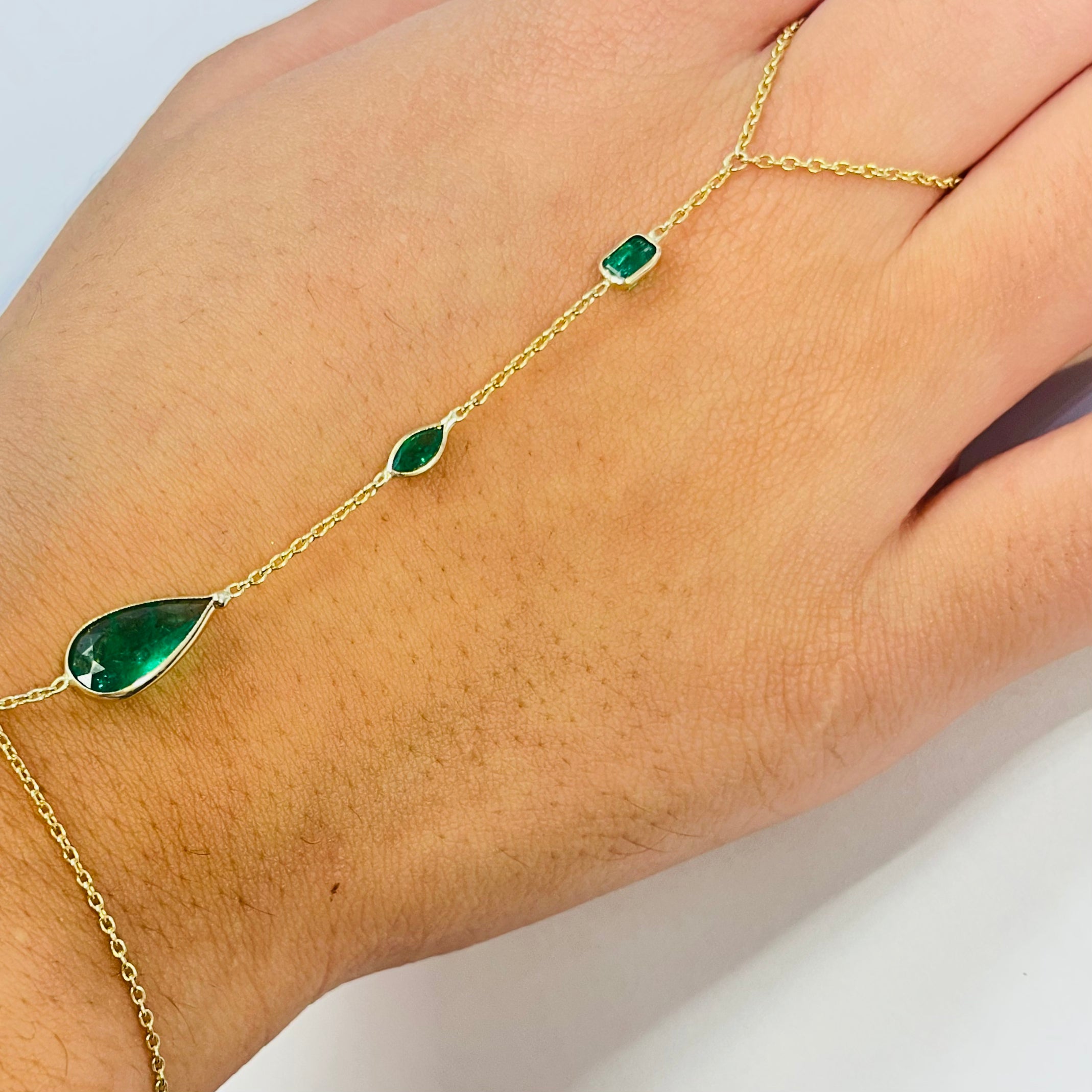 14k Yellow Gold 3 Stone Colombian Emerald Handchain