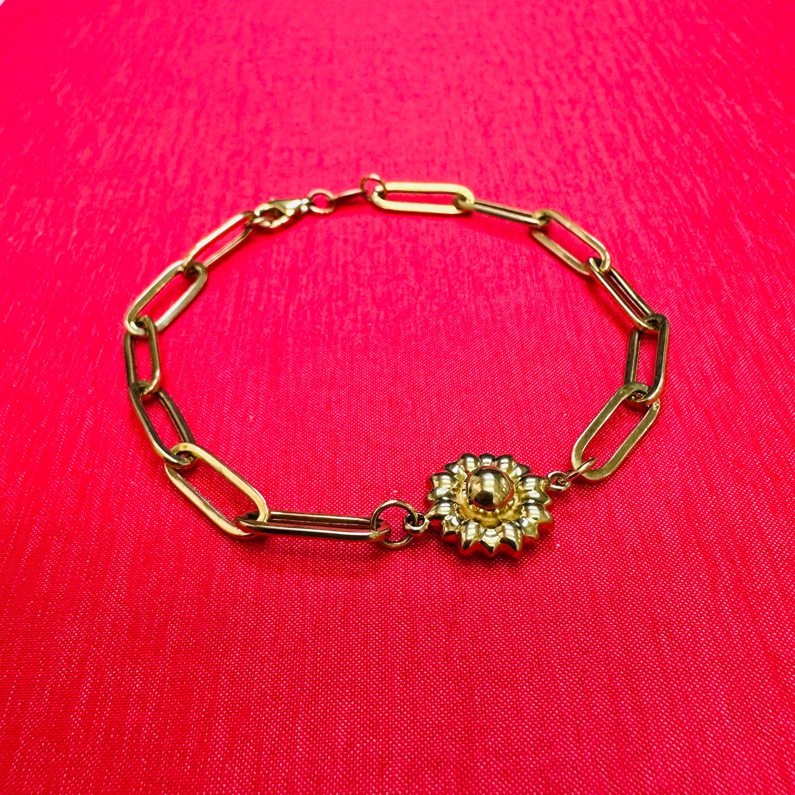 7.5” 14K Yellow Gold Puffy Paper Clip With Sun Flower In The Middle