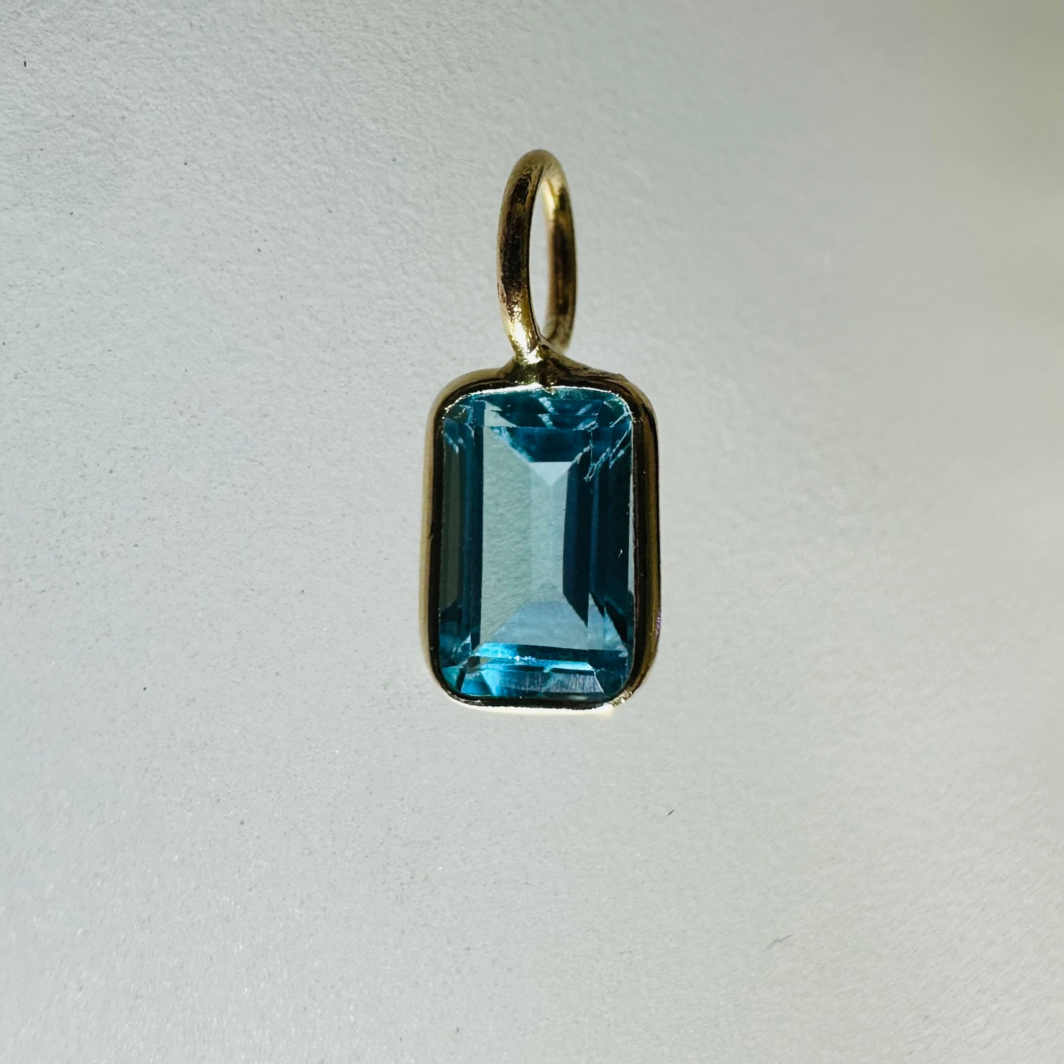 14K Blue Topaz Yellow Gold Emerald Cut Charm