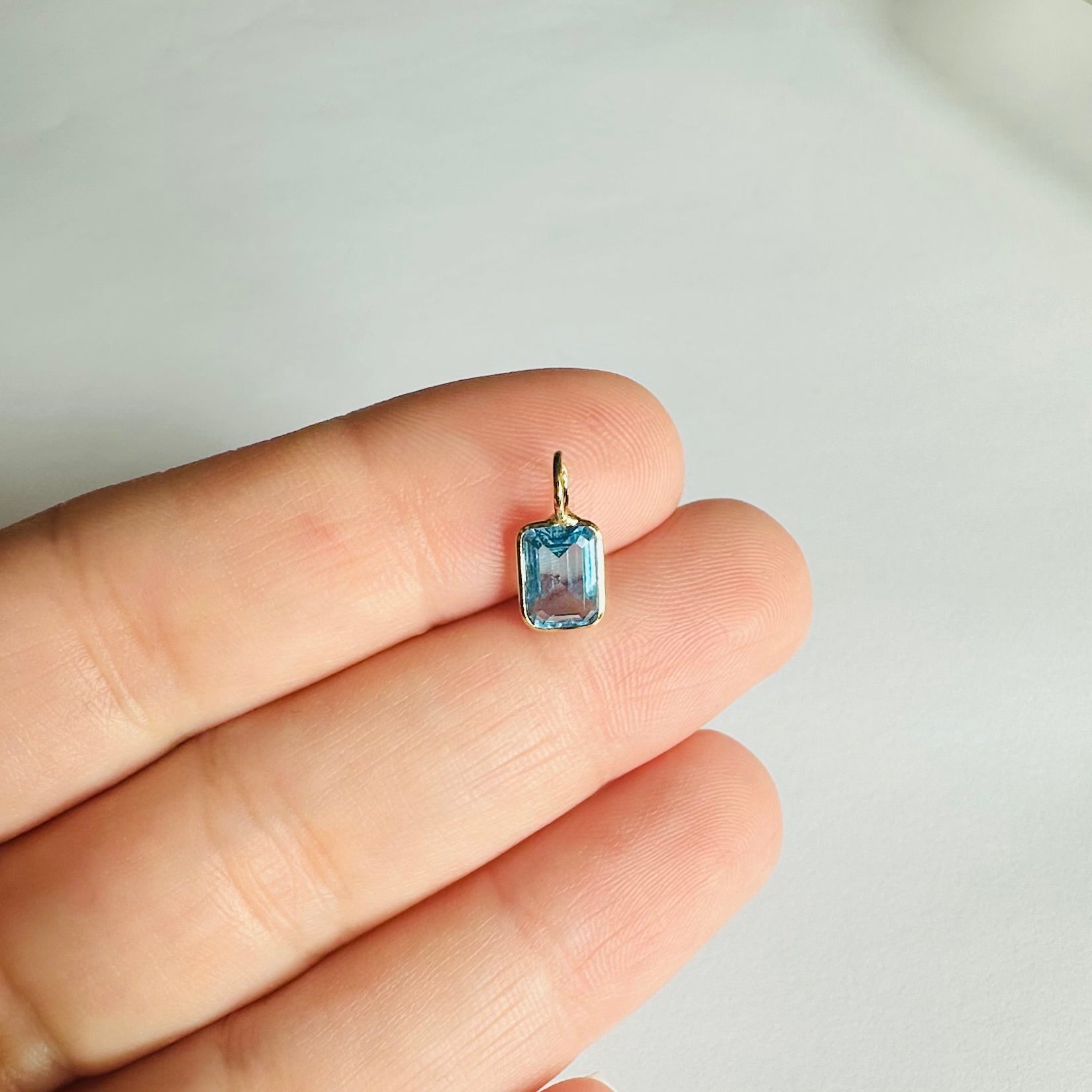 14K Blue Topaz Yellow Gold Emerald Cut Charm