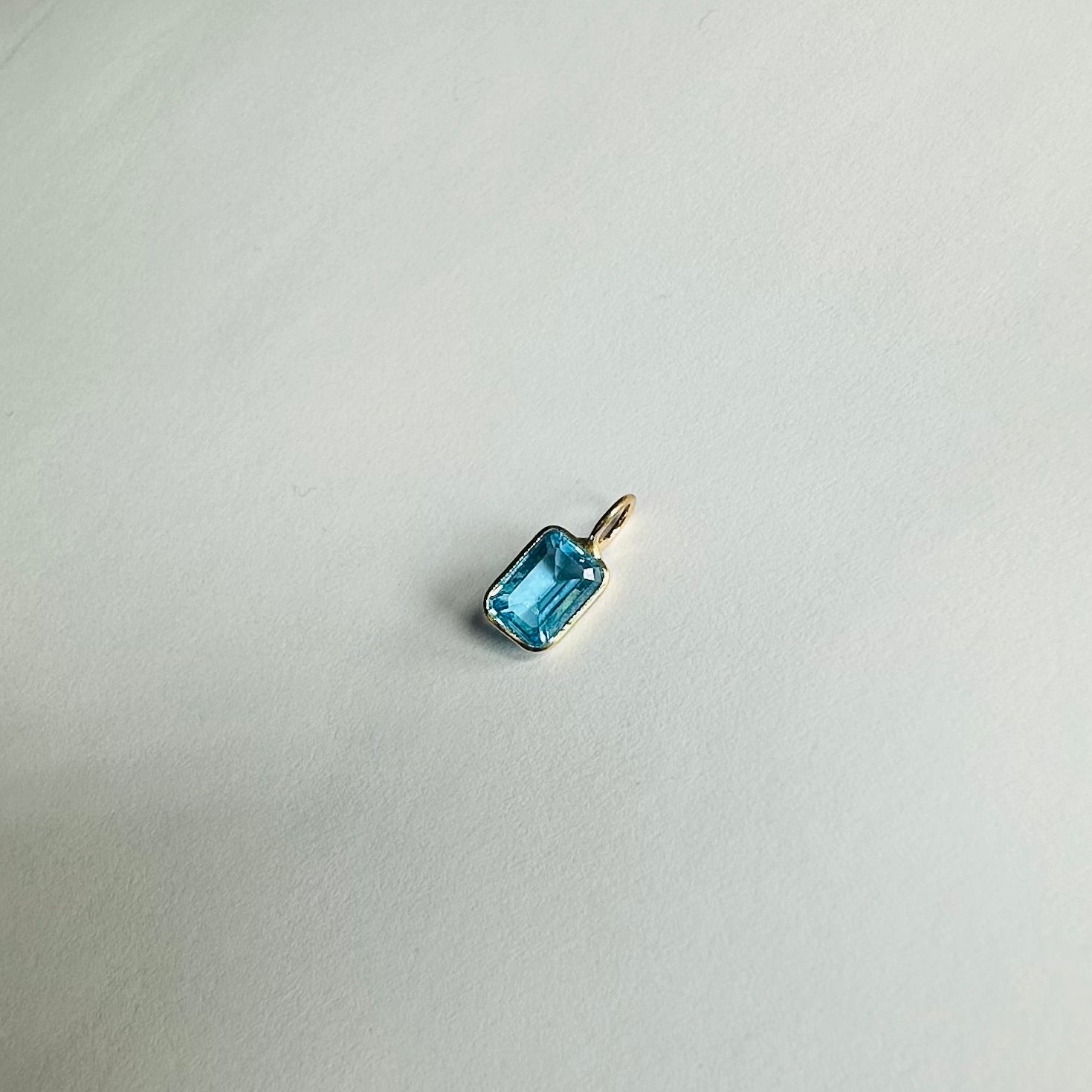 14K Blue Topaz Yellow Gold Emerald Cut Charm