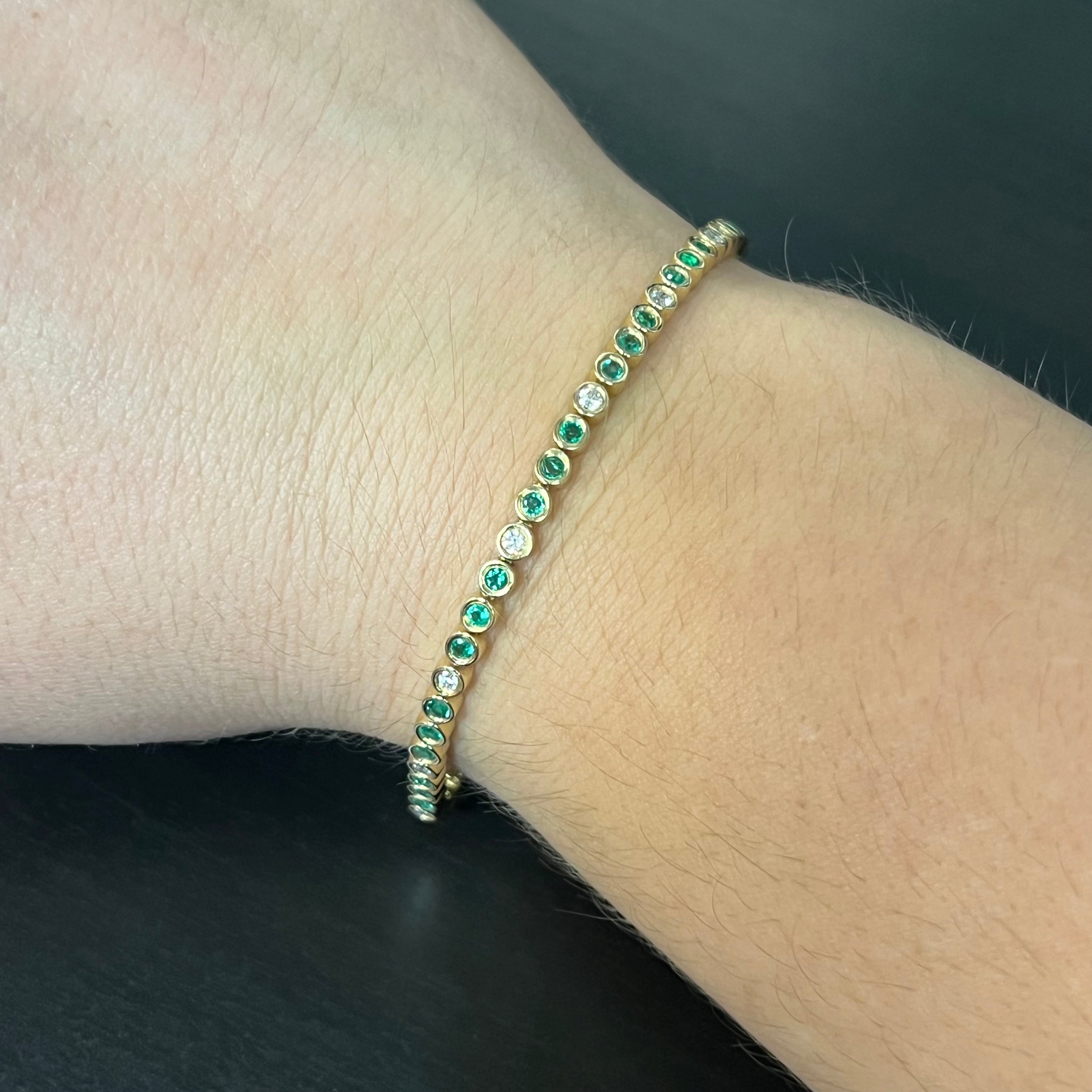 Stunning 14K Yellow Gold Emerald and Diamond Bezel Set Tennis Bracelet, 6.75"