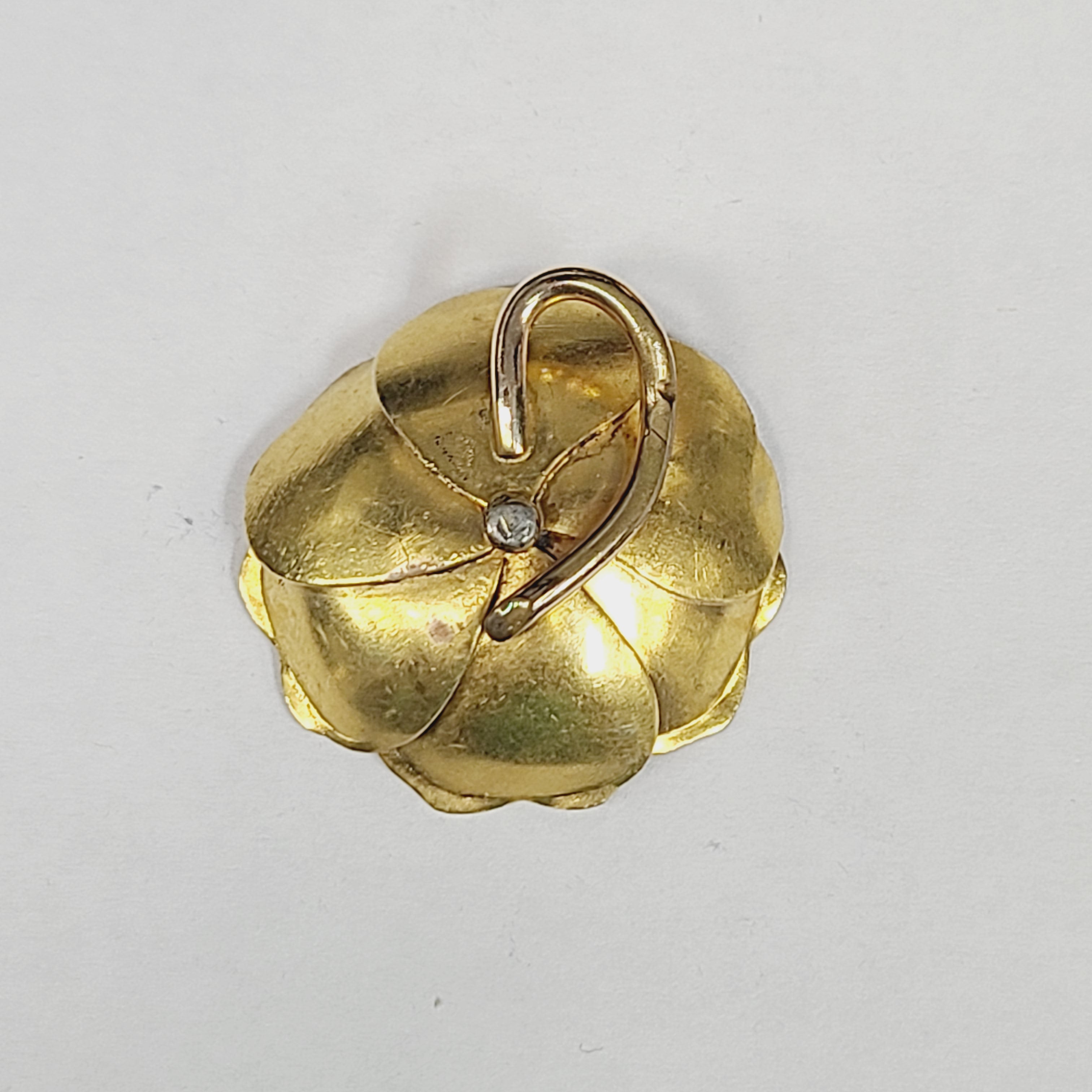 .48CT Old Mine Cut Diamond in an Articulated Gold Flower Pendant