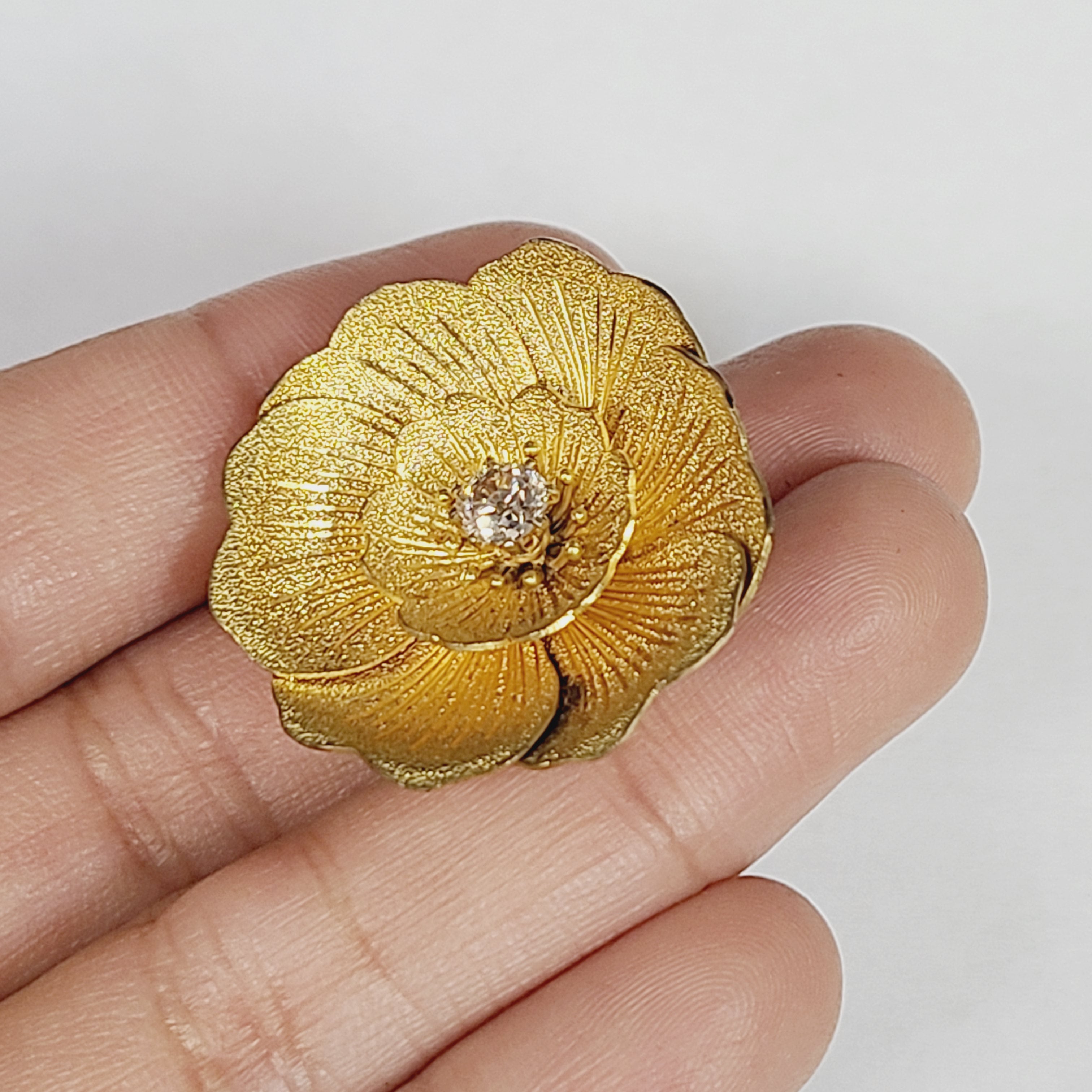.48CT Old Mine Cut Diamond in an Articulated Gold Flower Pendant