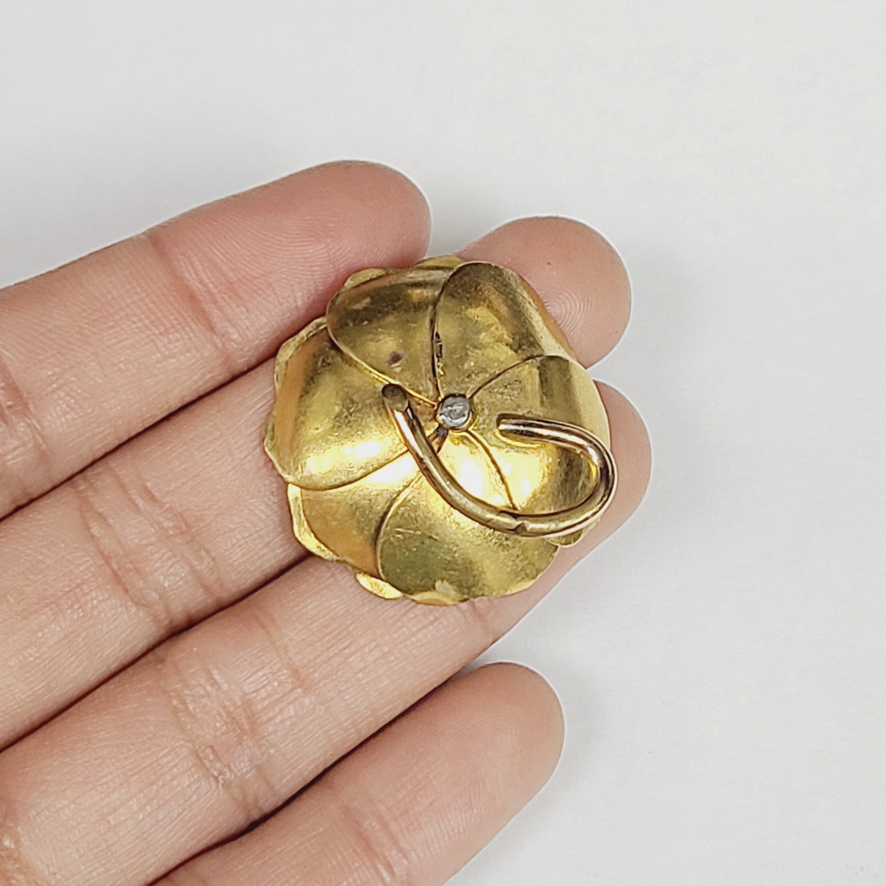 .48CT Old Mine Cut Diamond in an Articulated Gold Flower Pendant
