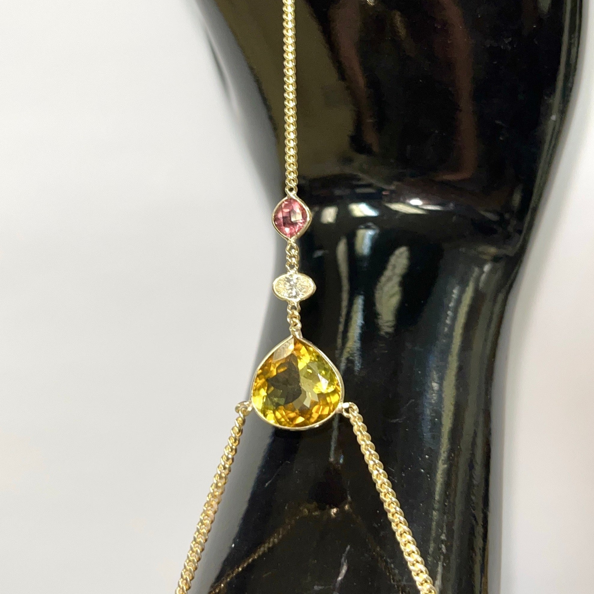Golden and Pink Tourmaline with a Diamond Hand Chain 14K Yellow Gold Curb Link