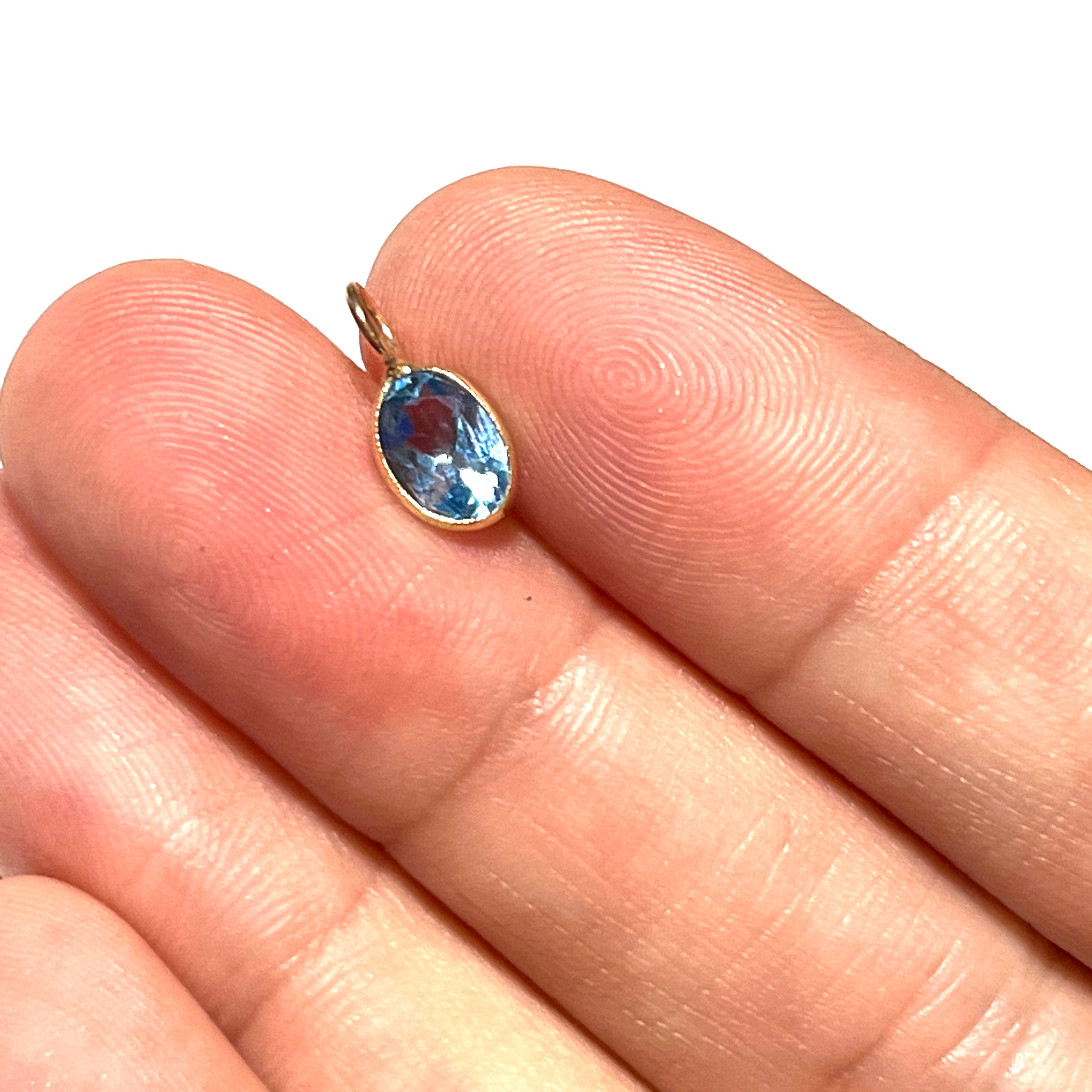 .86ct Natural Blue Oval Topaz 14K Yellow Gold Pendant Charm