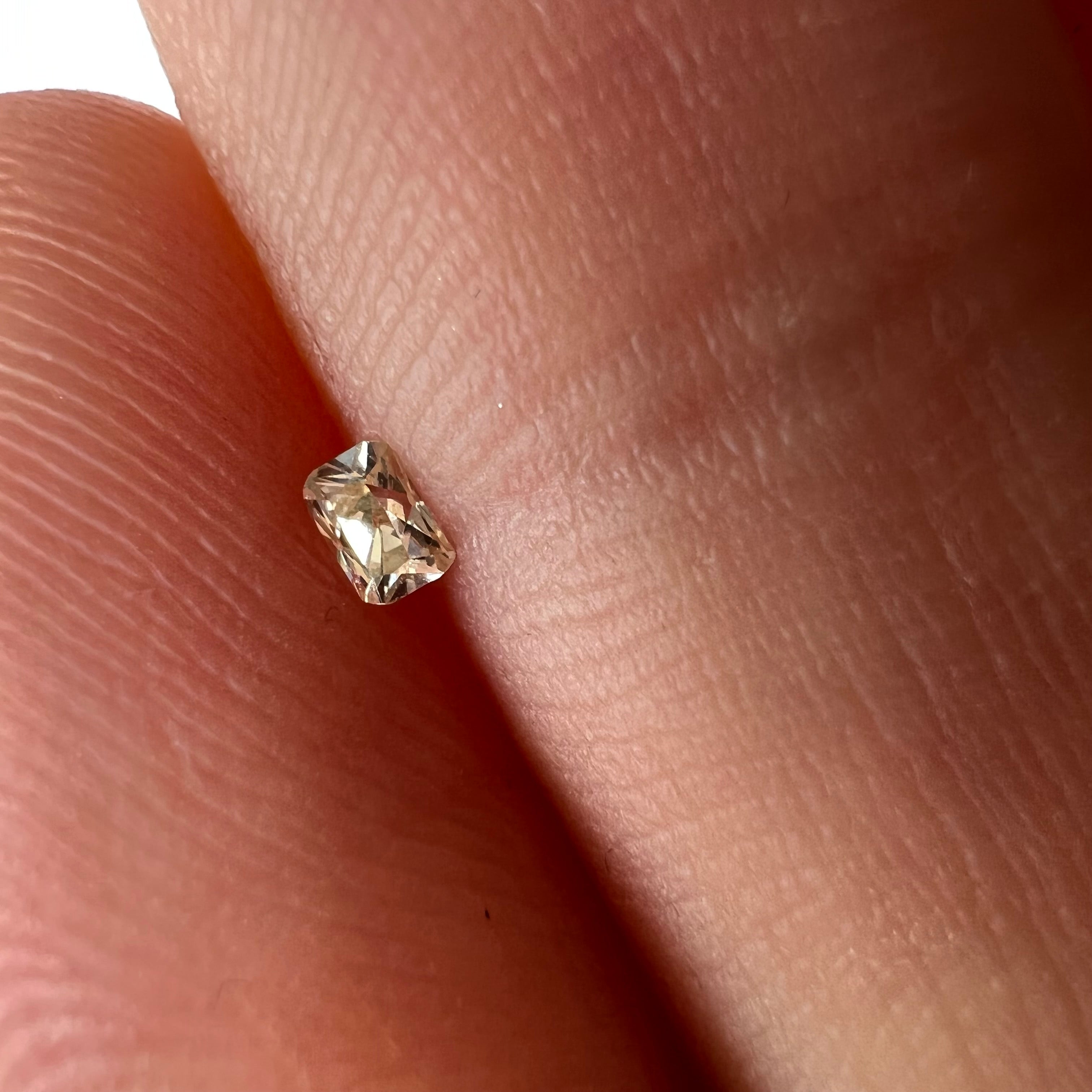 .065CT Emerald Cut Light Champagne SI1 2.66x1.82x1.67mm Natural Earth mined