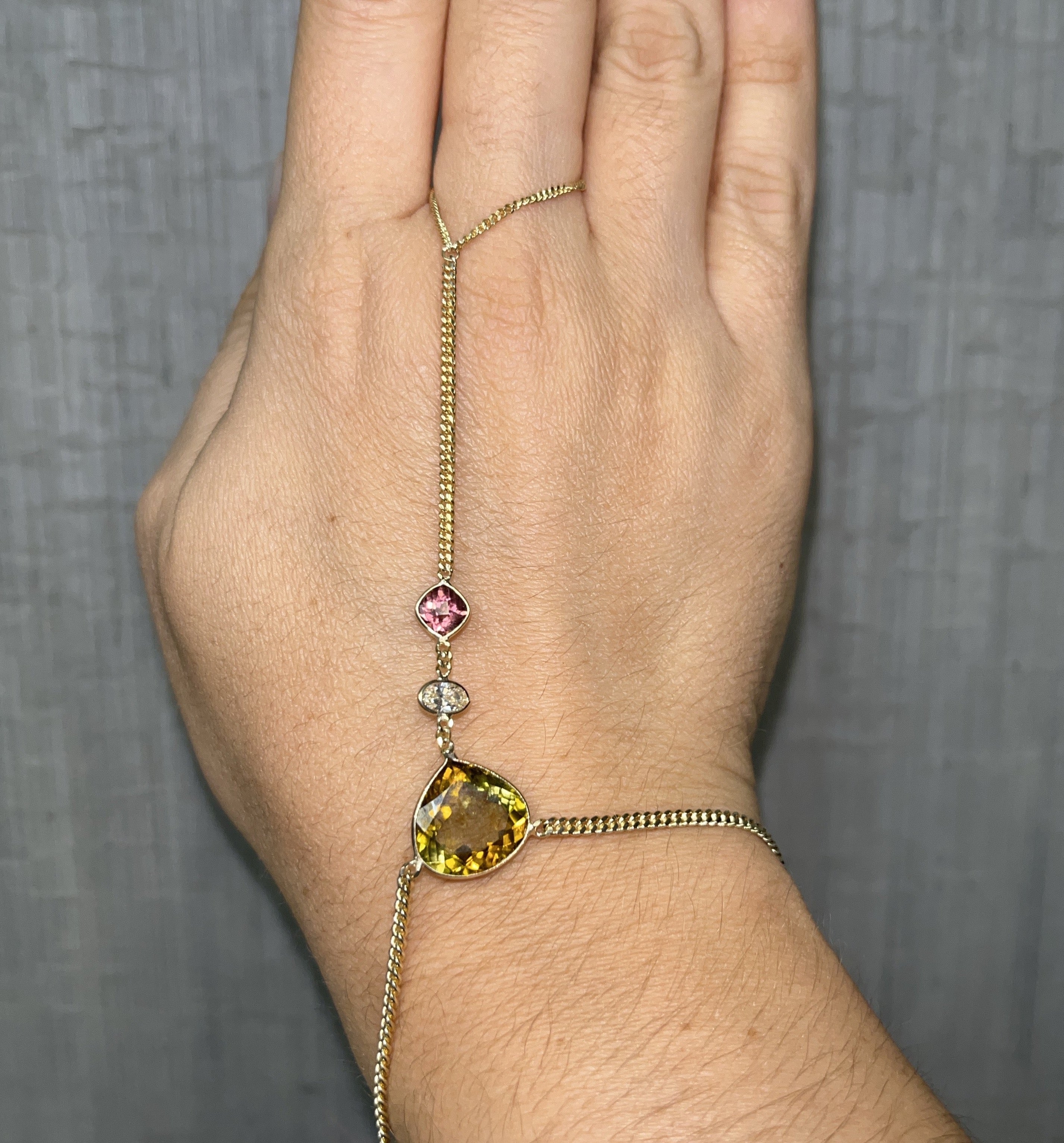 Golden and Pink Tourmaline with a Diamond Hand Chain 14K Yellow Gold Curb Link