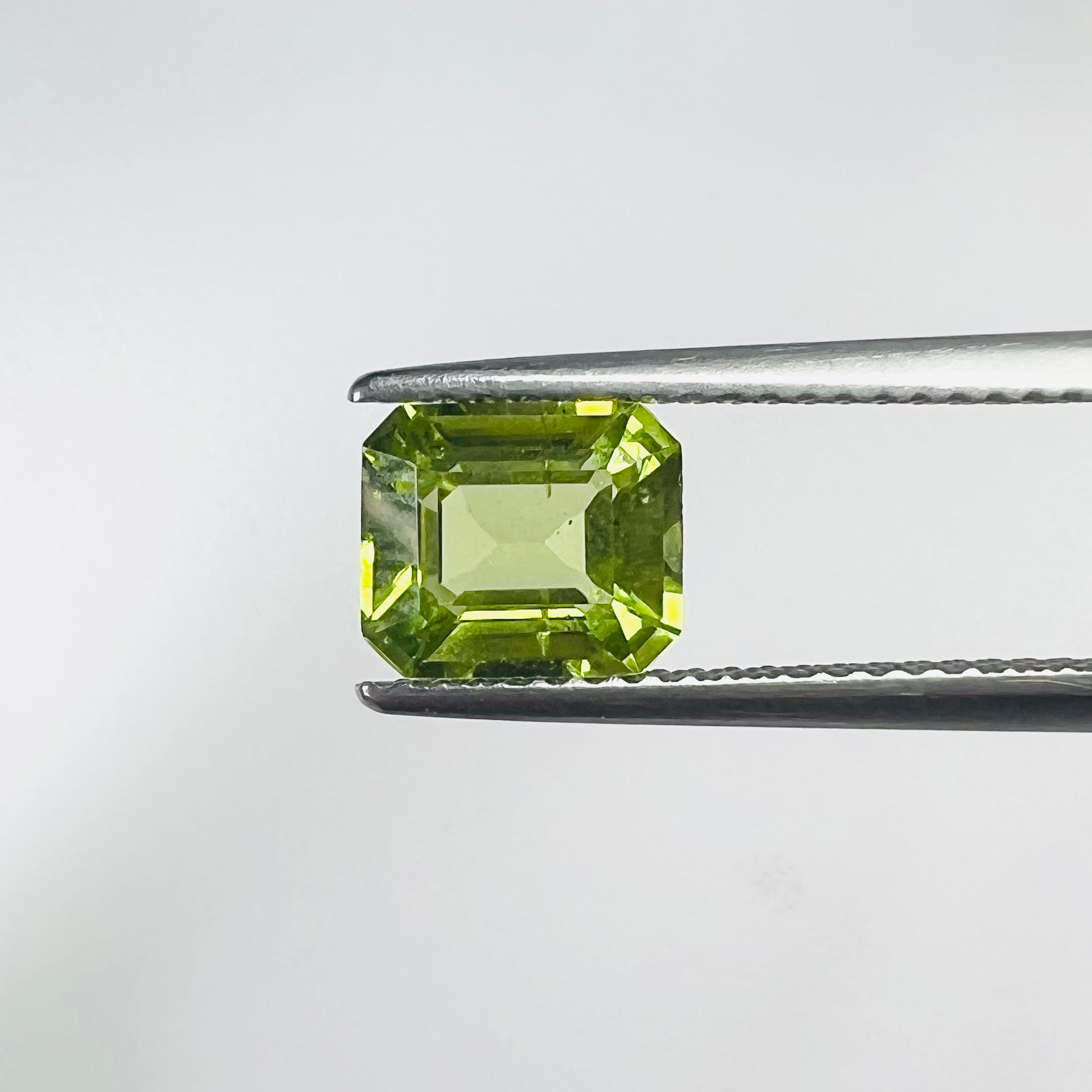 1.43CTW Loose Natural Emerald Cut Peridot 7.25x6.17x3.77mm Earth mined Gemstone