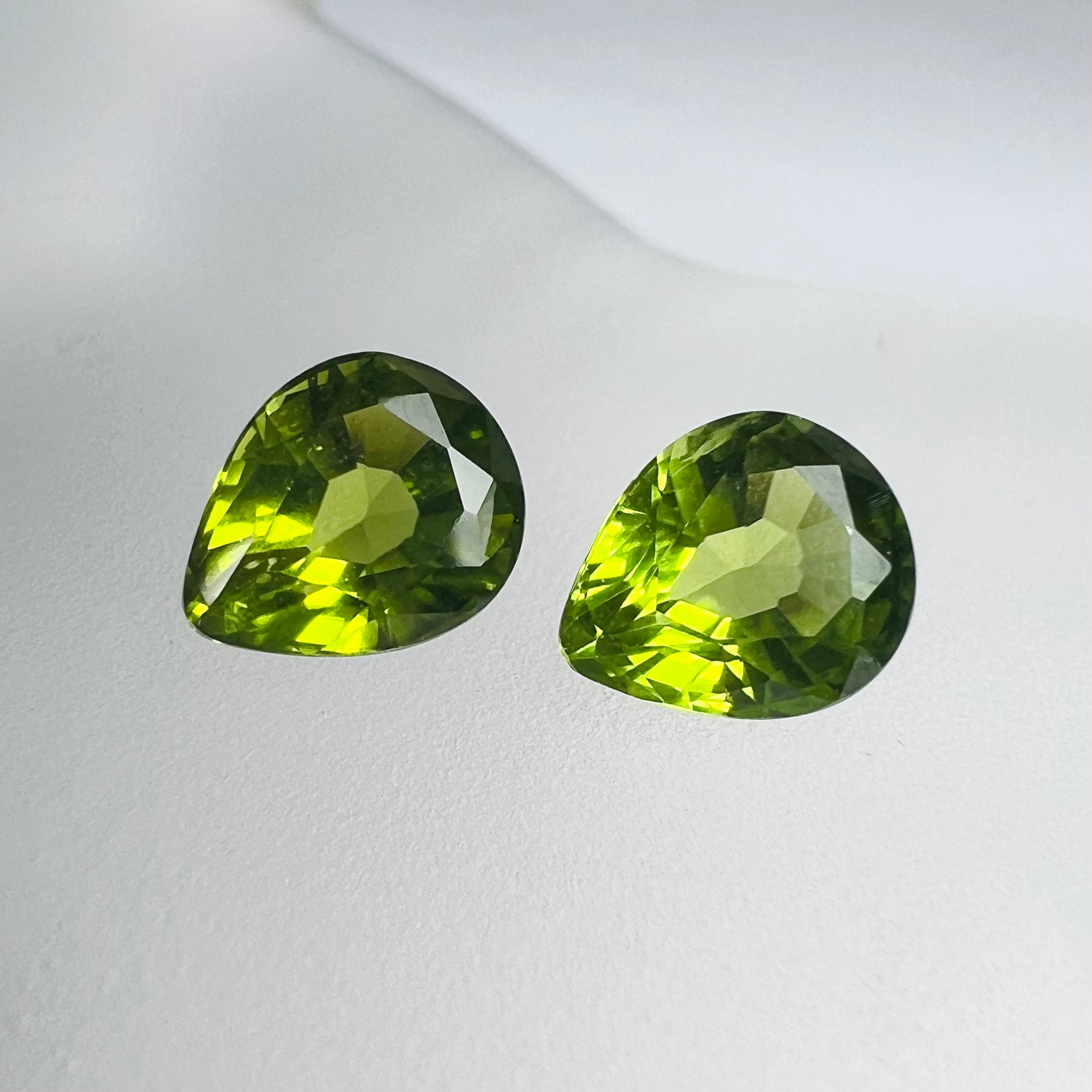 4.37CTW Pair of Loose Natural Pear Cut Peridot 8.60x7.05x5mm Earth mined Gemston