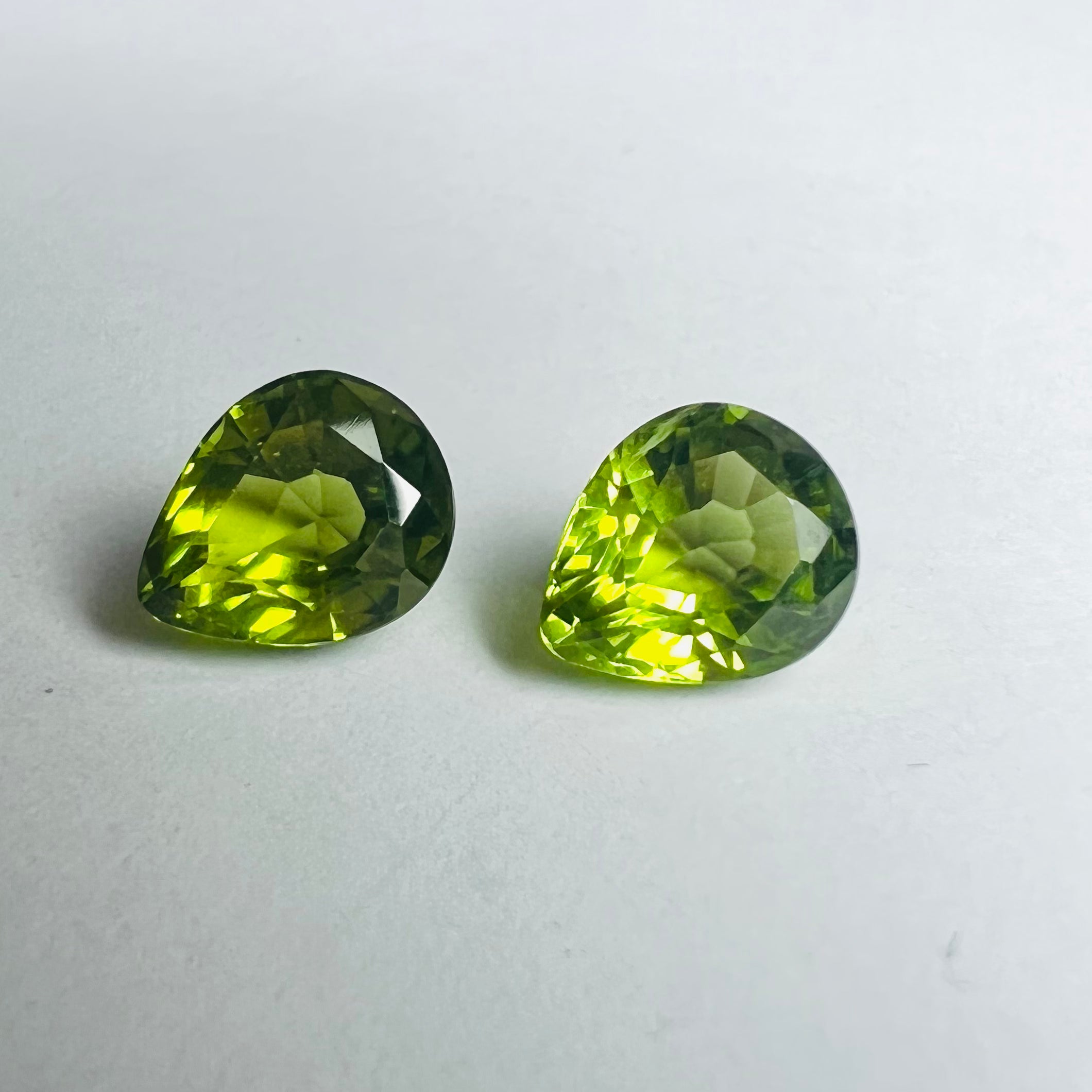 4.37CTW Pair of Loose Natural Pear Cut Peridot 8.60x7.05x5mm Earth mined Gemston