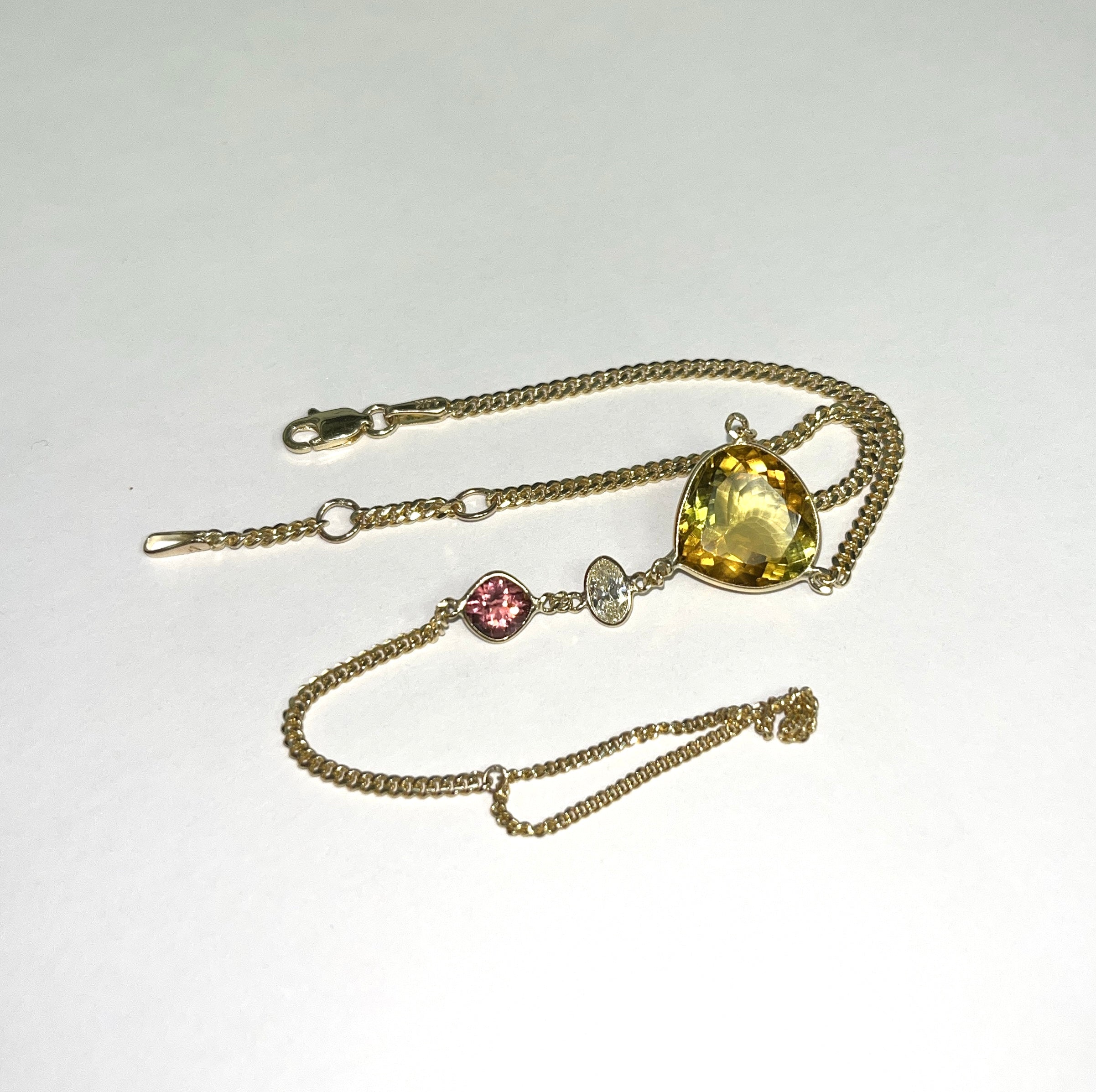 Golden and Pink Tourmaline with a Diamond Hand Chain 14K Yellow Gold Curb Link