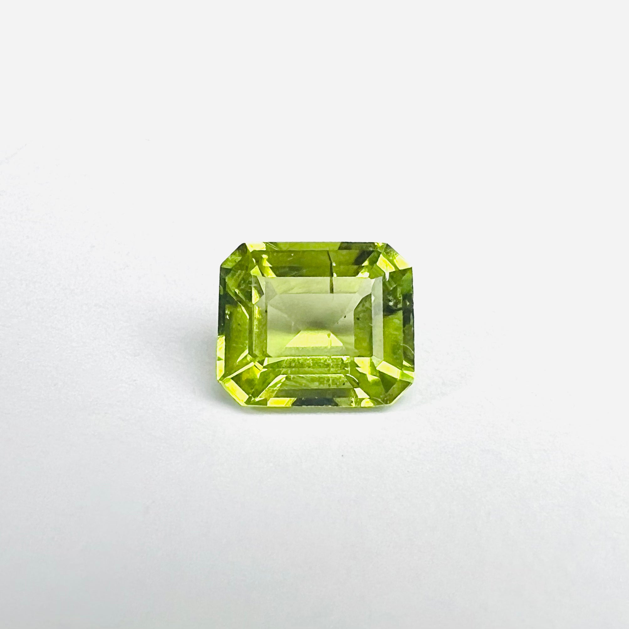 1.43CTW Loose Natural Emerald Cut Peridot 7.25x6.17x3.77mm Earth mined Gemstone