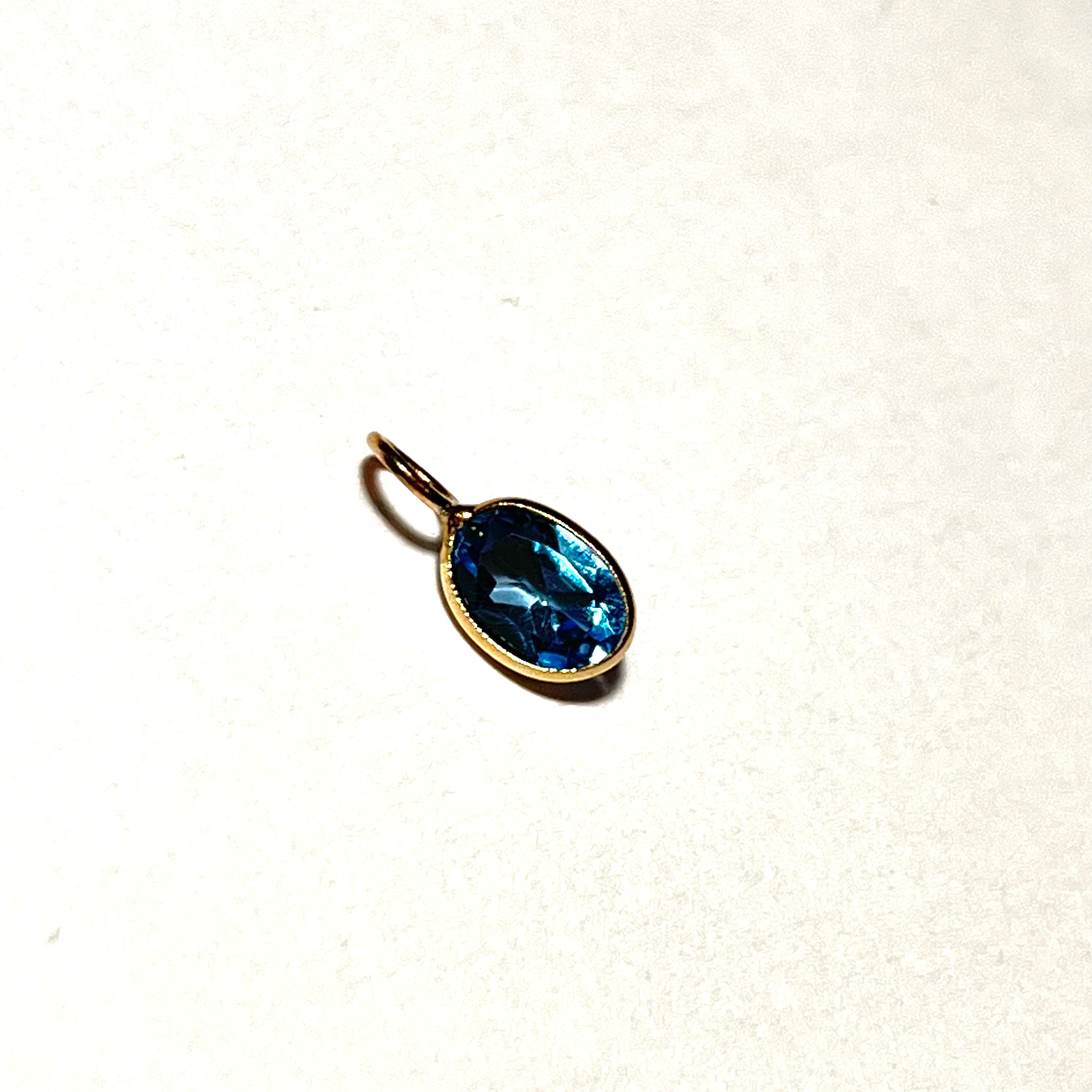 .86ct Natural Blue Oval Topaz 14K Yellow Gold Pendant Charm