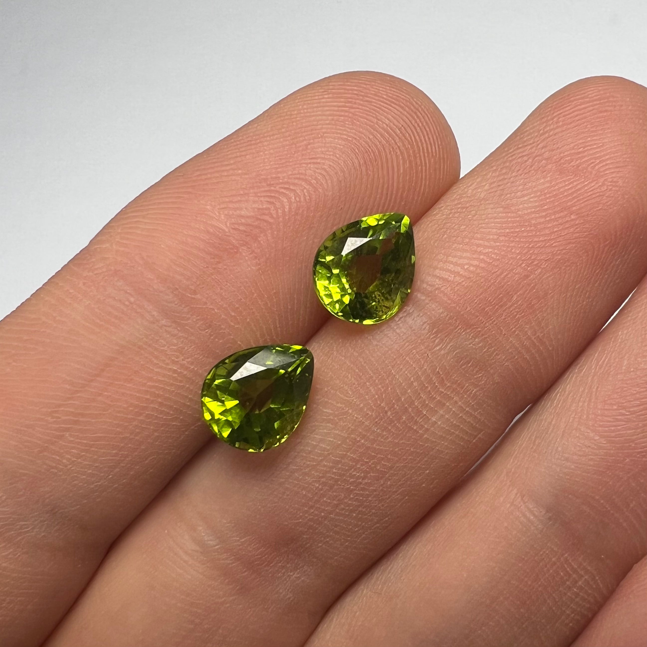 4.37CTW Pair of Loose Natural Pear Cut Peridot 8.60x7.05x5mm Earth mined Gemston