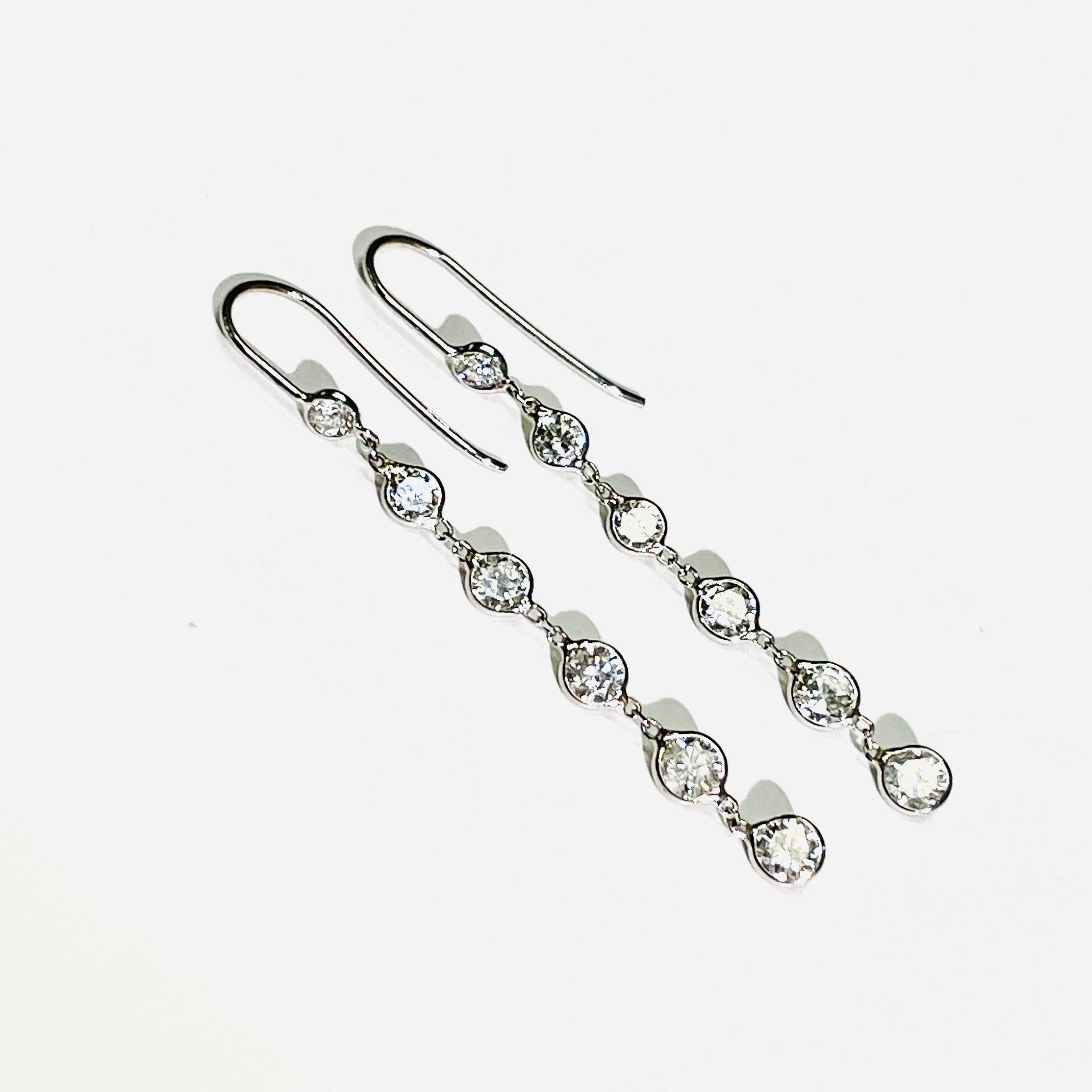 1.2ct Graduated Natural Diamond Earrings