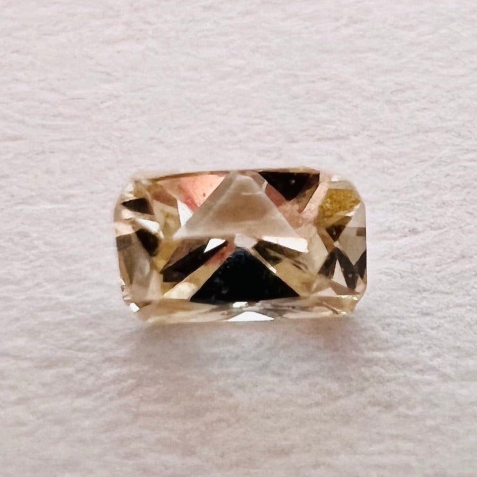 .065CT Emerald Cut Light Champagne SI1 2.66x1.82x1.67mm Natural Earth mined