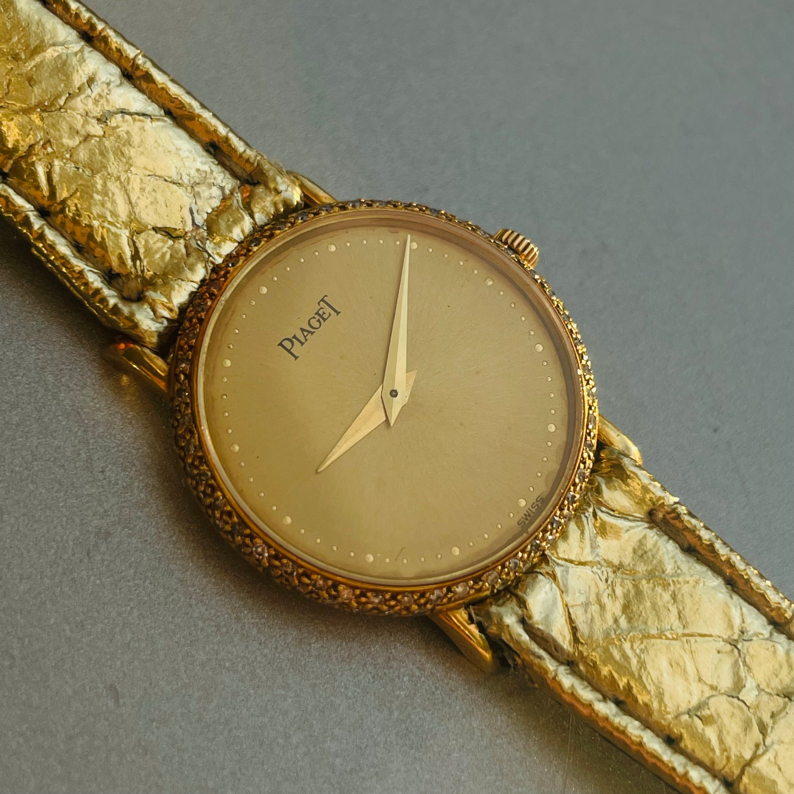 21mm Ladies Piaget 18K Yellow Gold Watch with Gold Snak eskin Strap