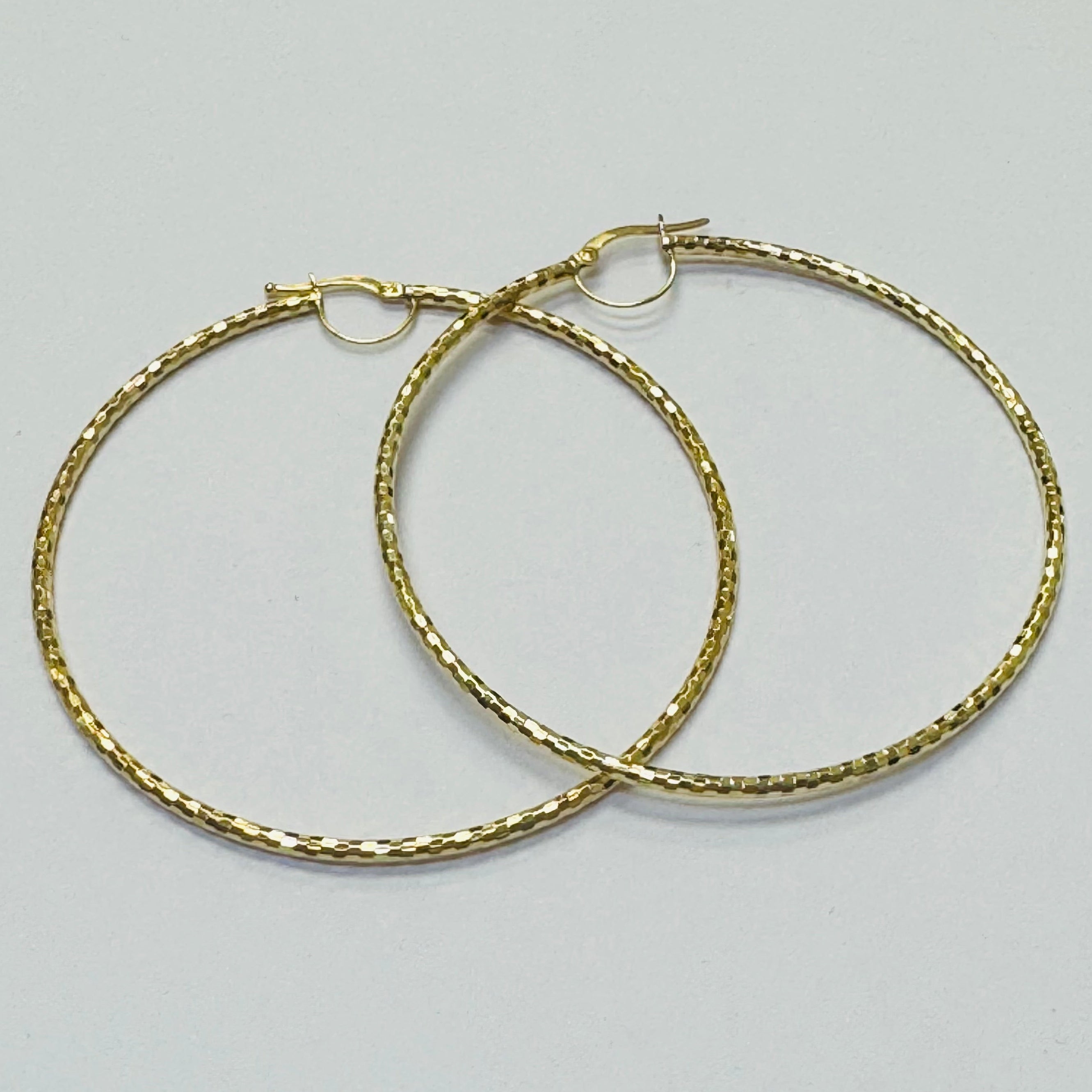 2.5” Shimmering 10K Yellow Gold Hoop Earrings