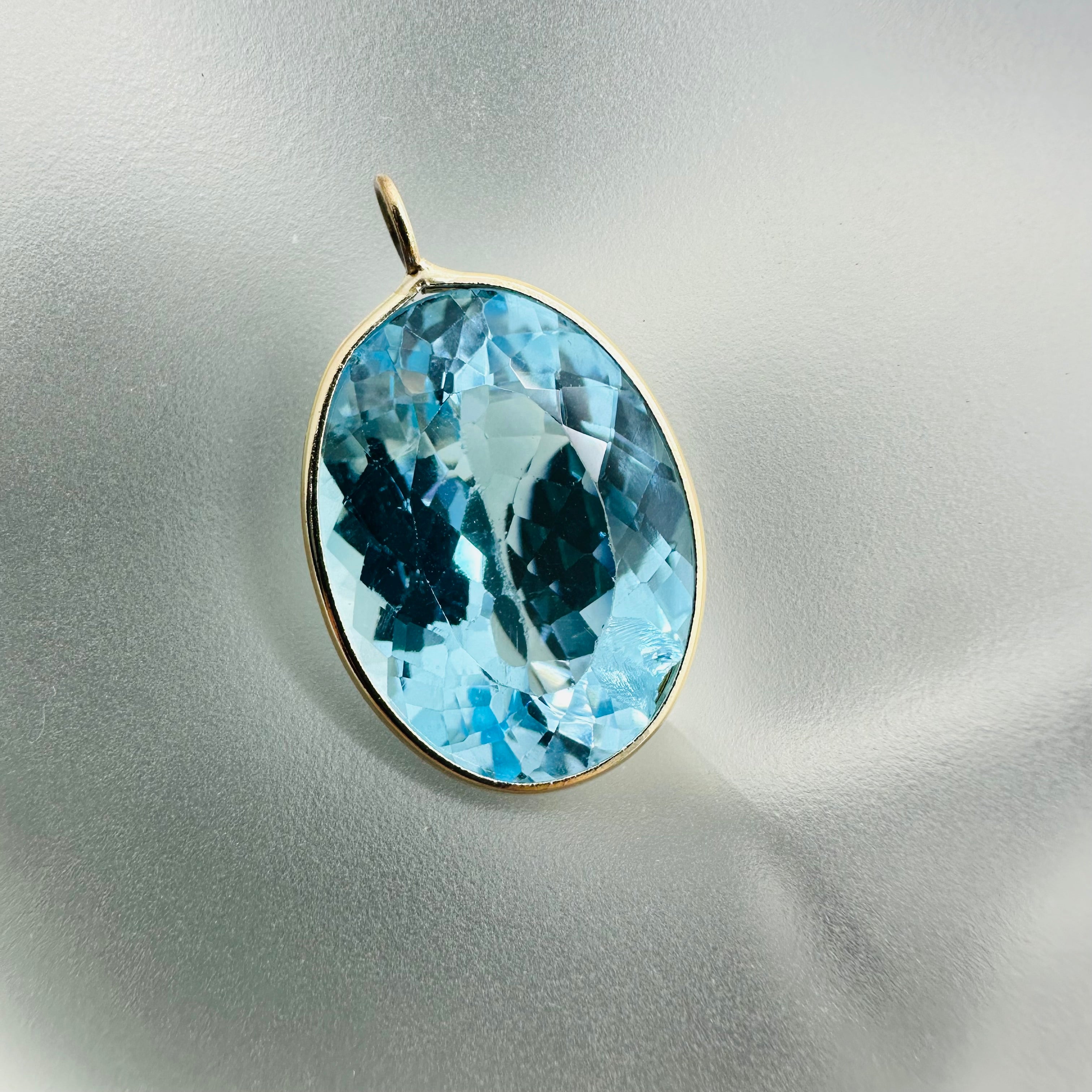 Blue Topaz 14K Yellow Gold Charm Pendant Oval Shape