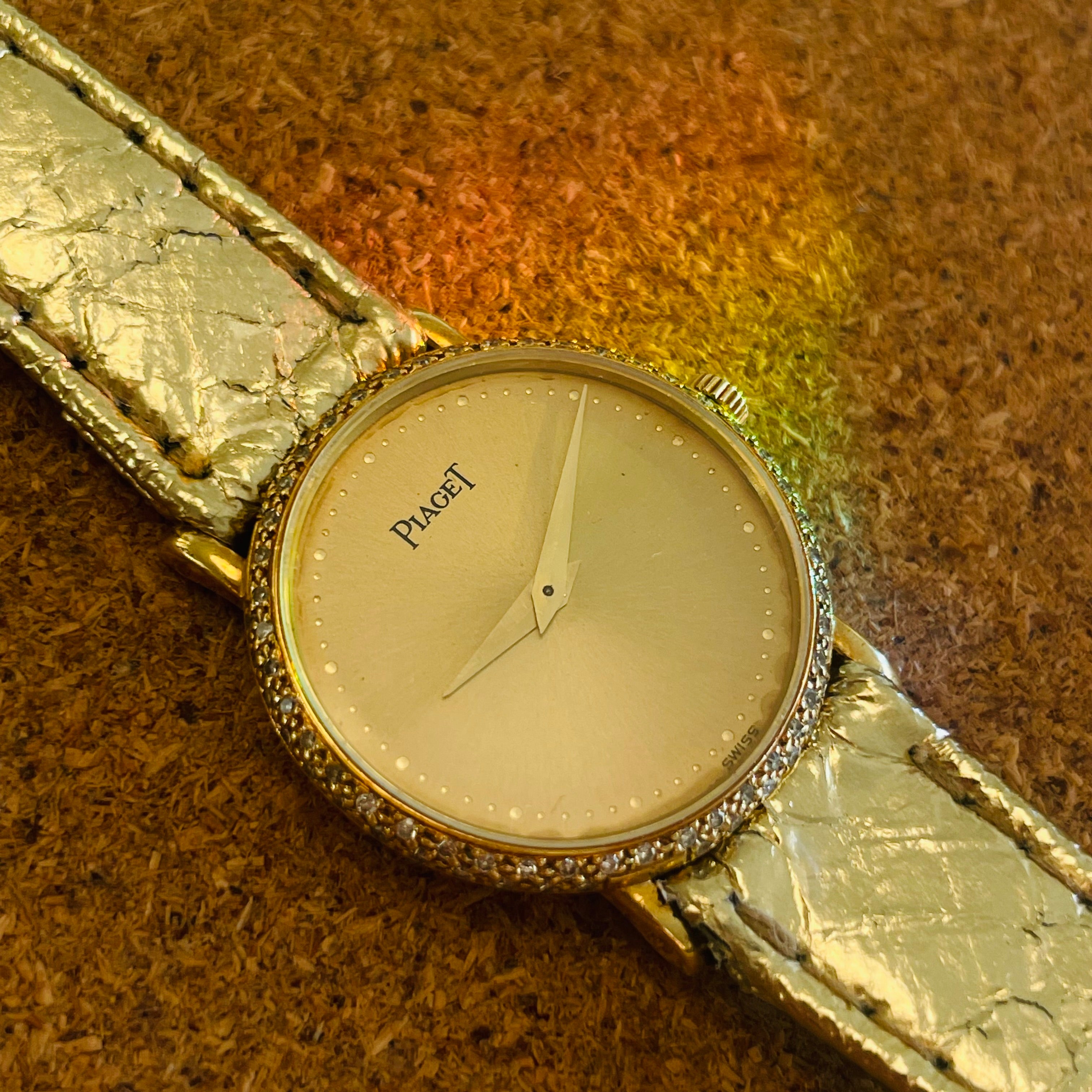 21mm Ladies Piaget 18K Yellow Gold Watch with Gold Snak eskin Strap