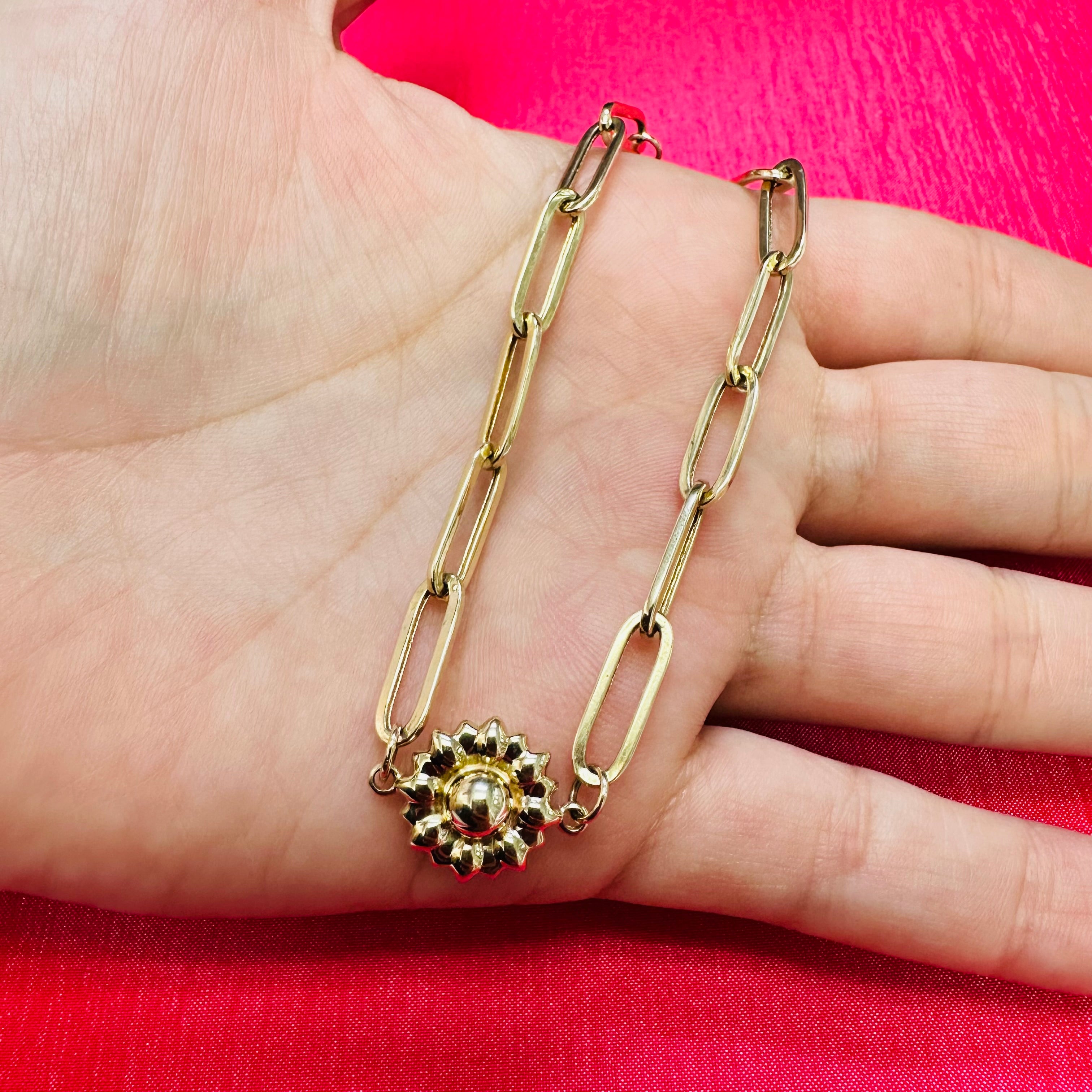 7.5” 14K Yellow Gold Puffy Paper Clip With Sun Flower In The Middle