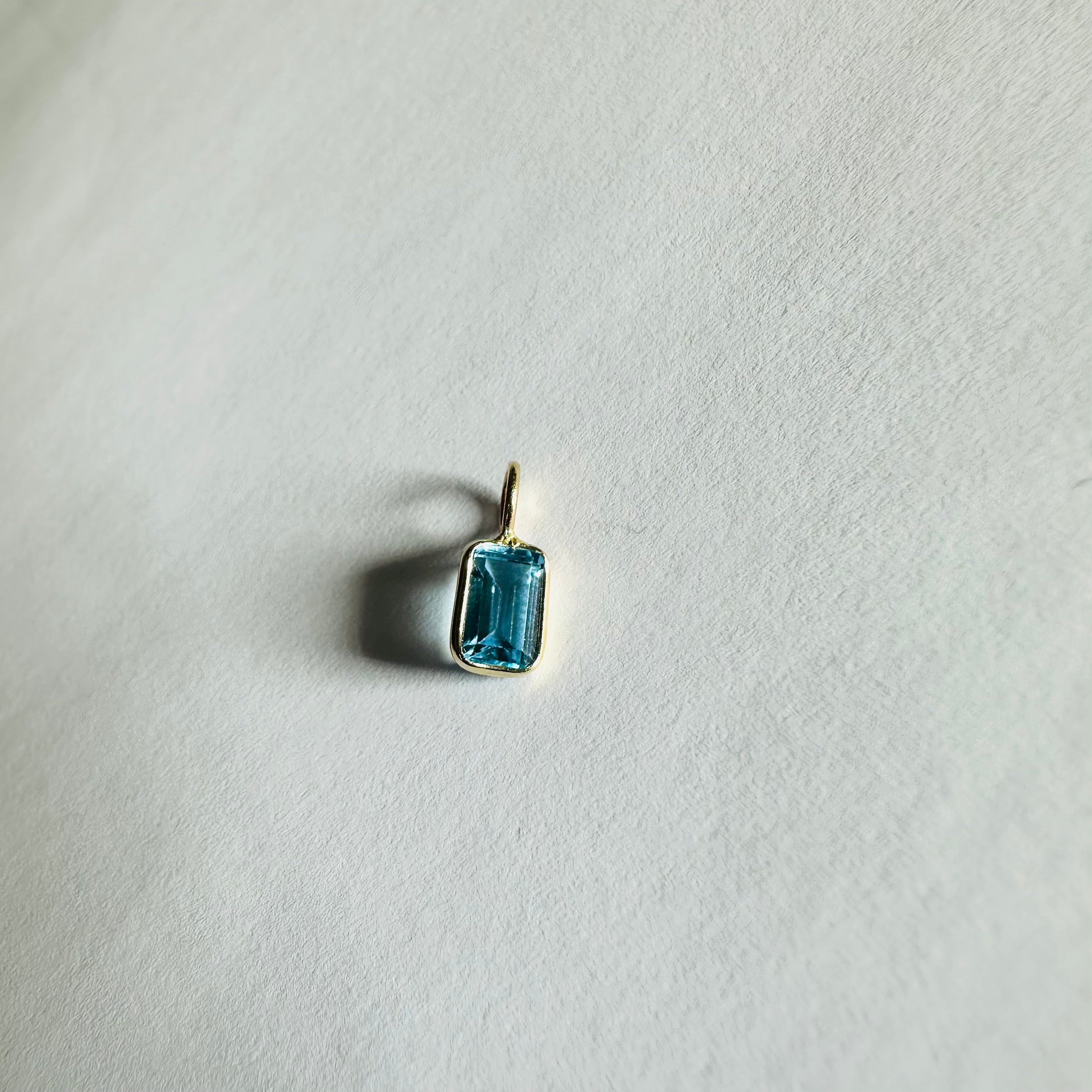 14K Blue Topaz Yellow Gold Emerald Cut Charm