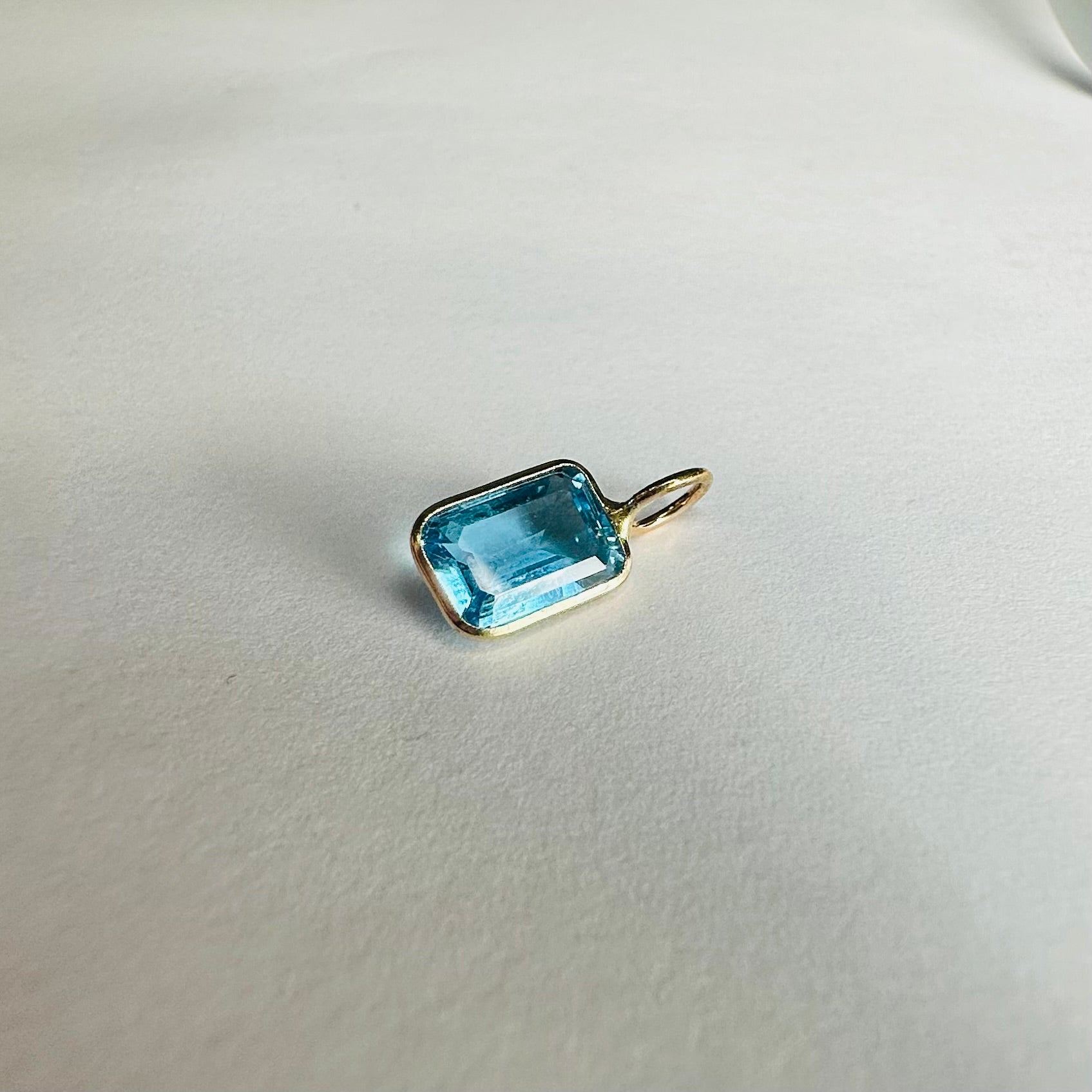 14K Blue Topaz Yellow Gold Emerald Cut Charm