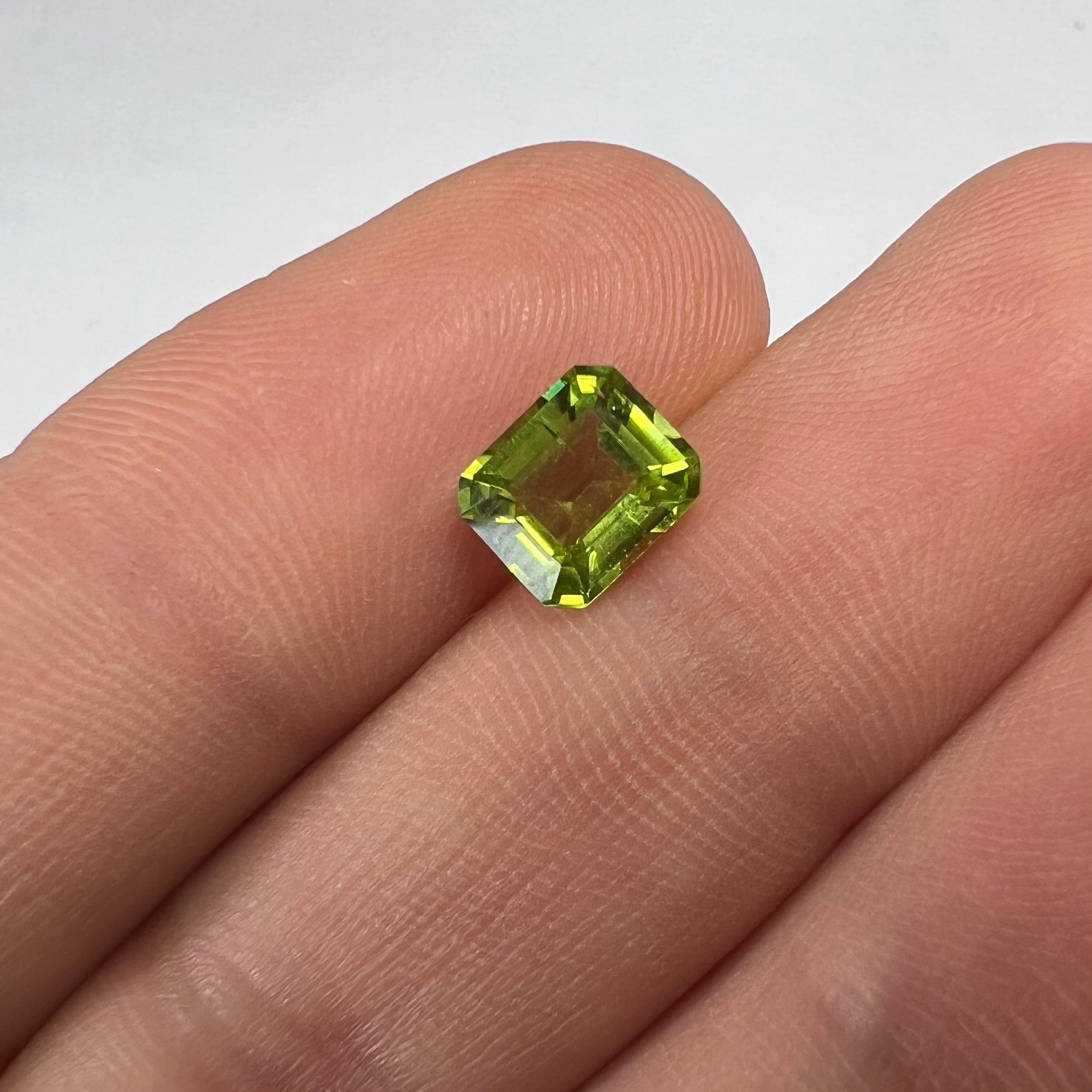 1.43CTW Loose Natural Emerald Cut Peridot 7.25x6.17x3.77mm Earth mined Gemstone