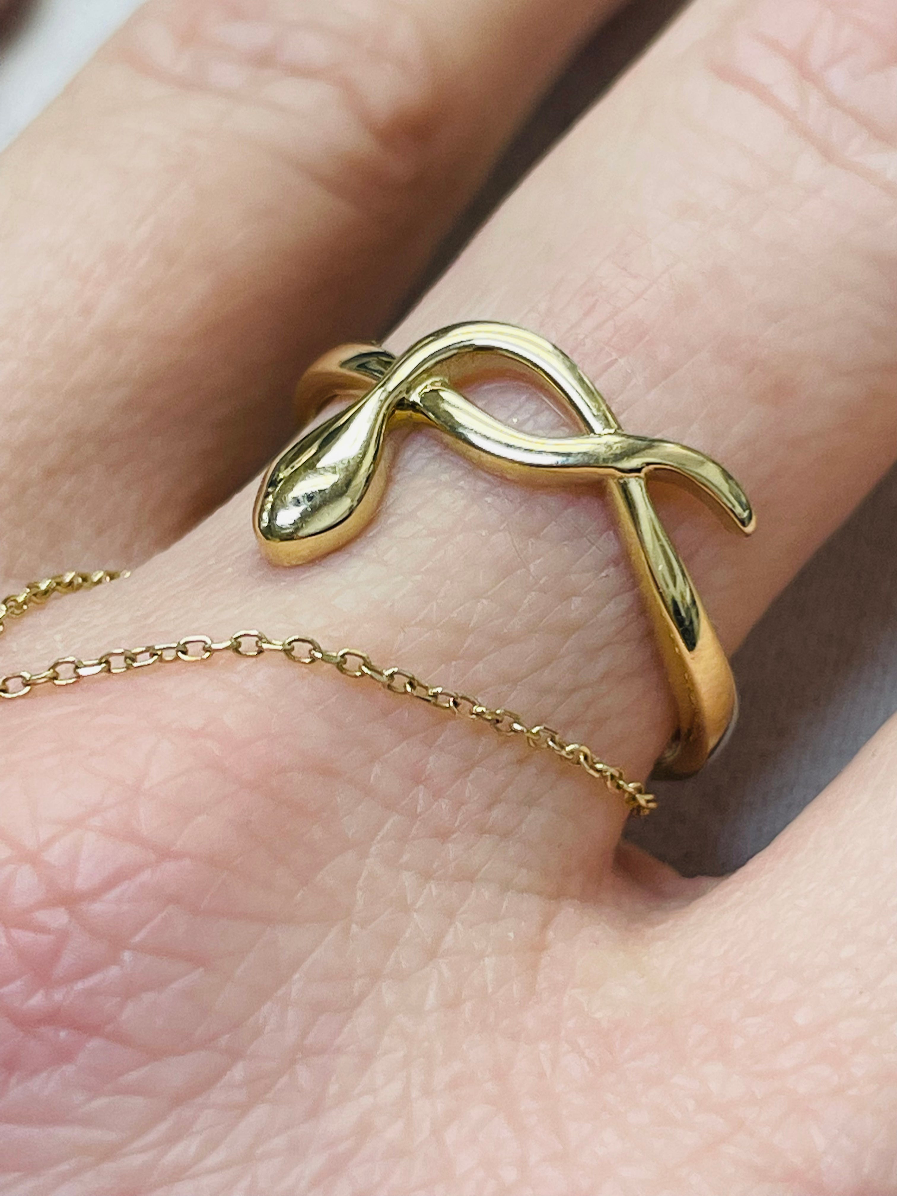 Sleek 18K Yellow Gold Snake Ring Size 7.25
