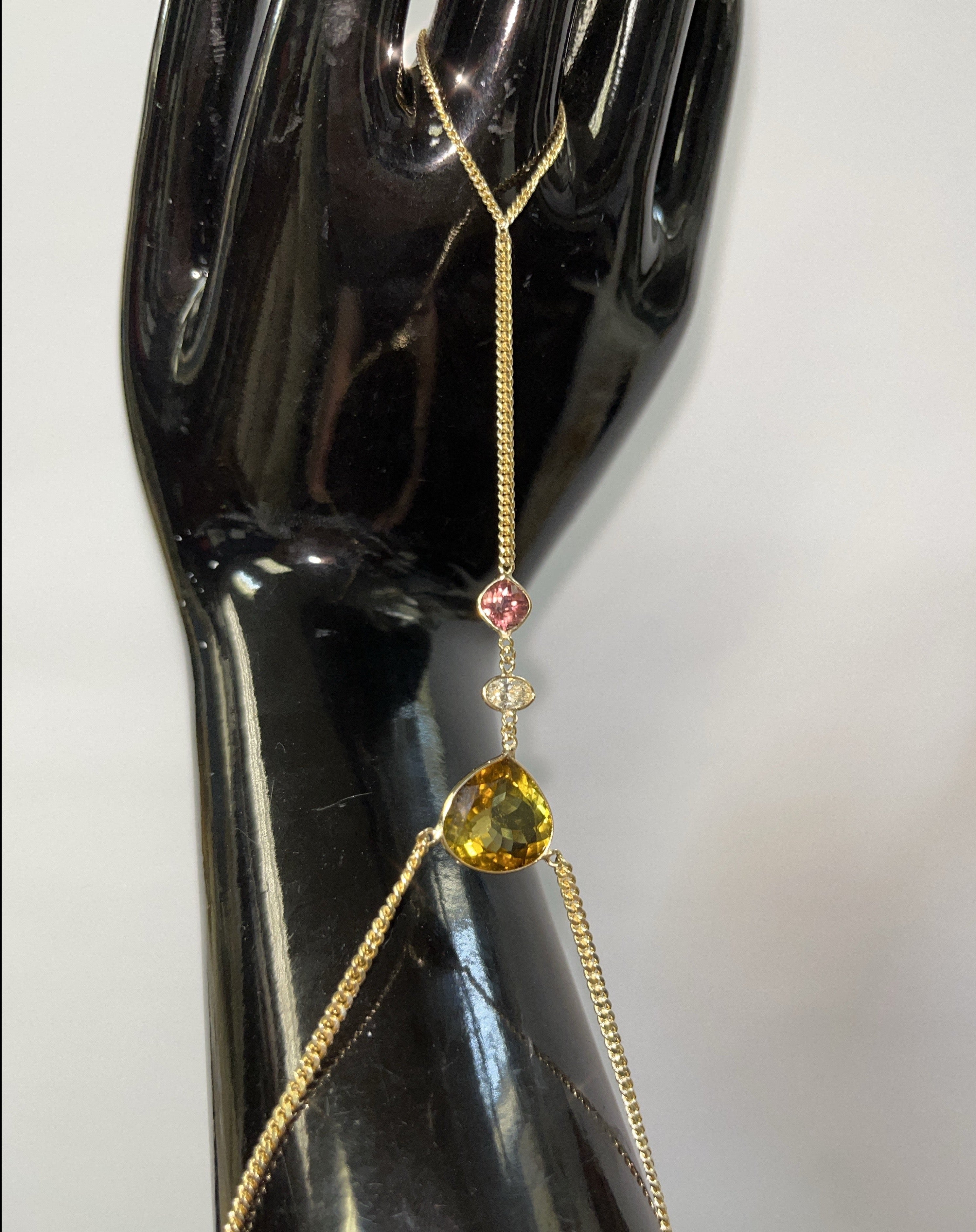 Golden and Pink Tourmaline with a Diamond Hand Chain 14K Yellow Gold Curb Link
