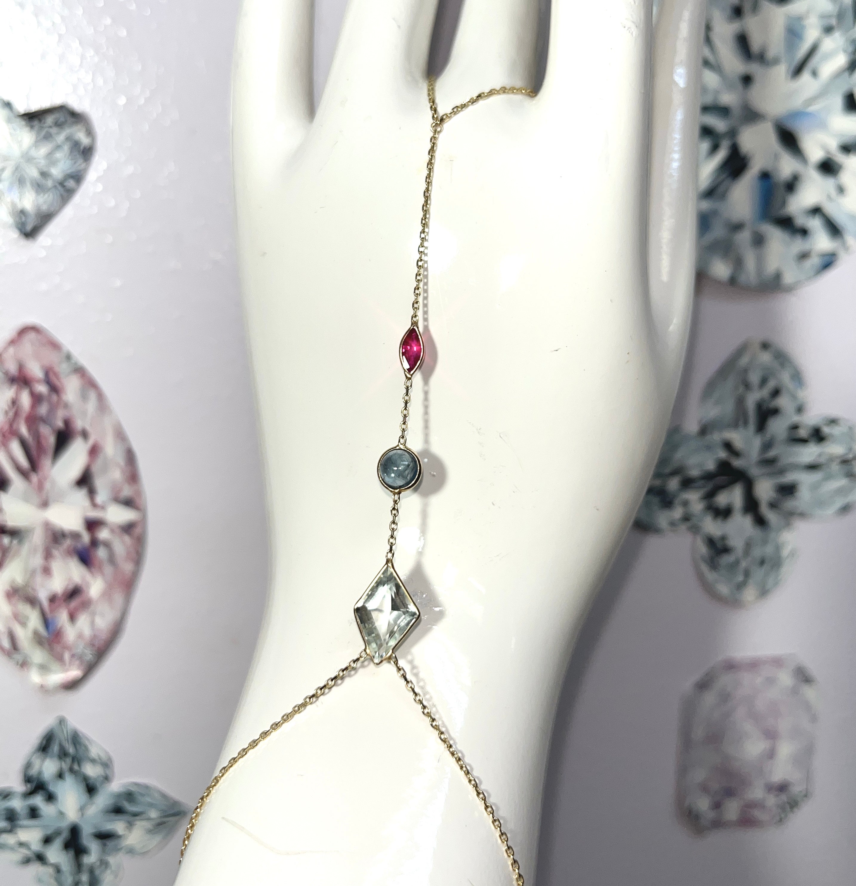Aquamarine Sapphire and Ruby Handchain in solid 14k Yellow Gold