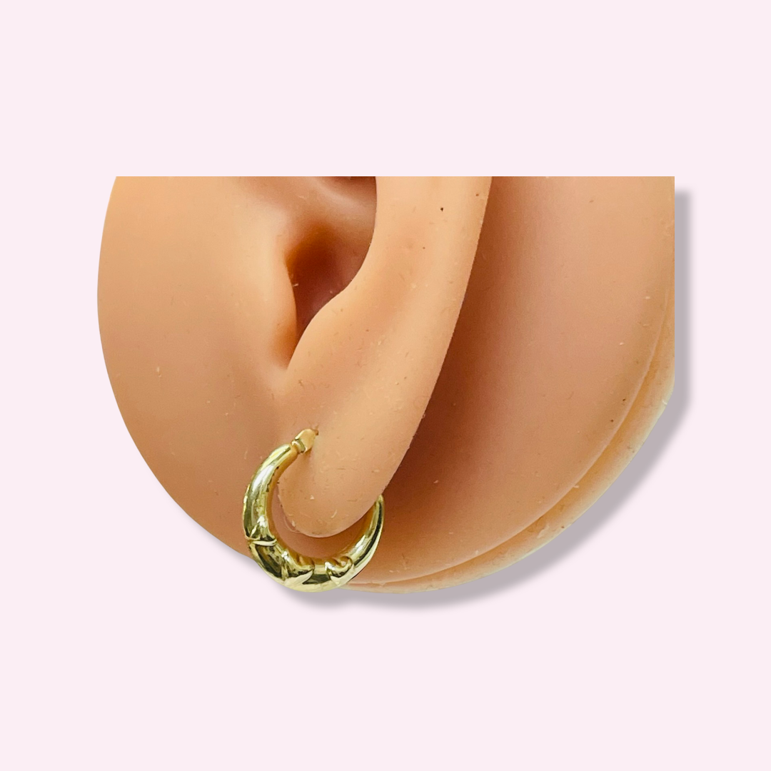 .65” 10K Yellow Gold Tapered Three Heart Pattern Hoop Earrings