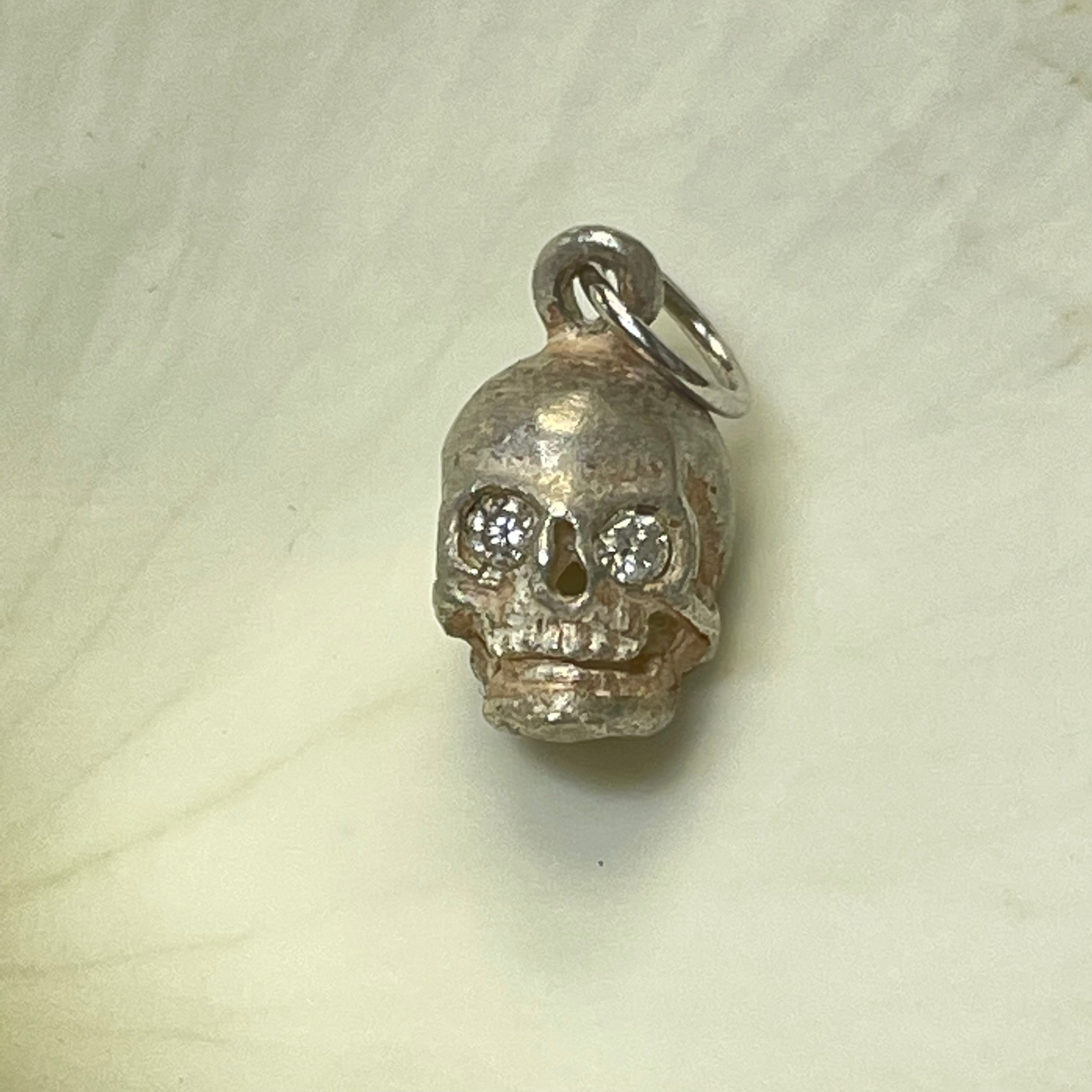Sterling Silver Skull with Diamond Eyes Charm